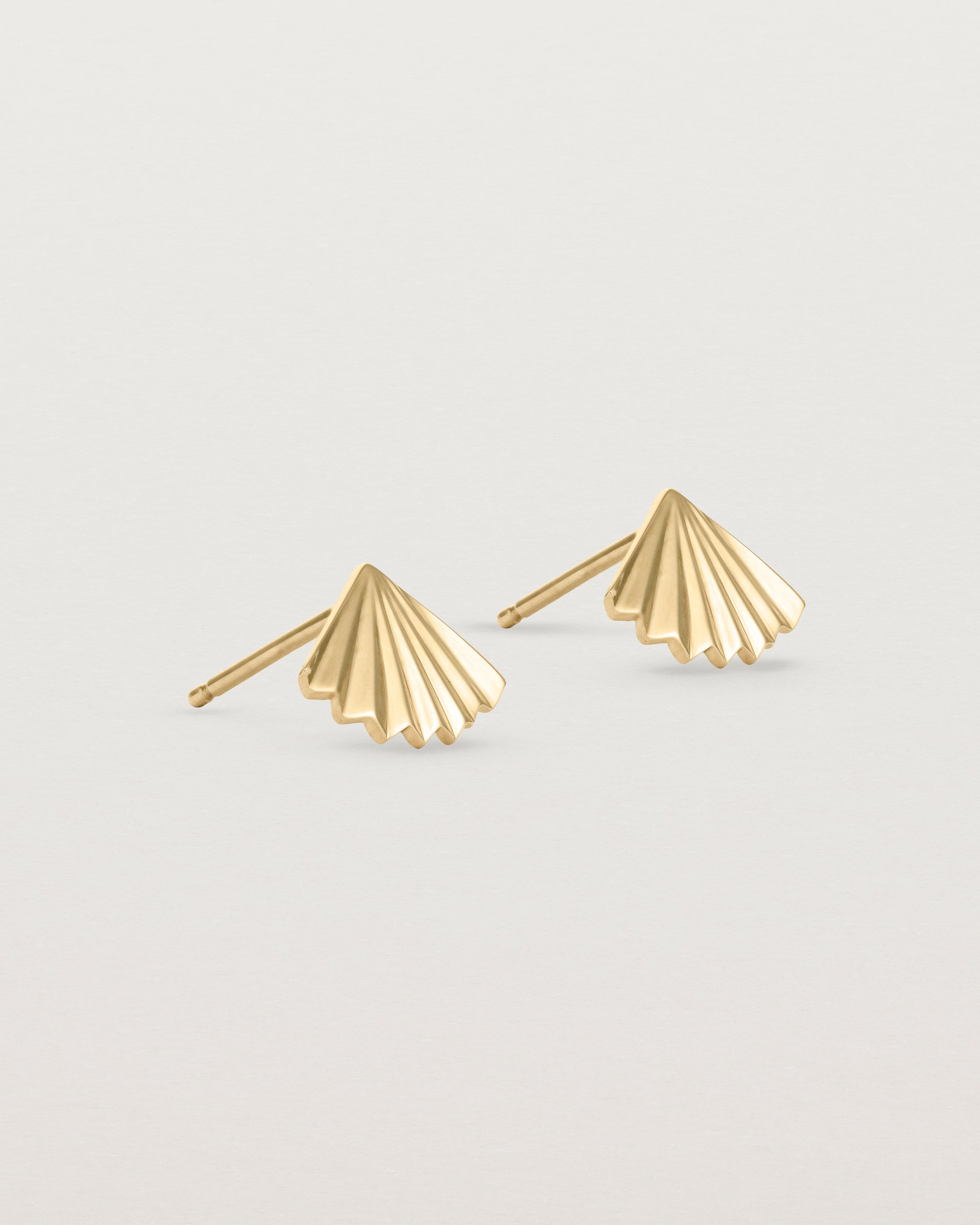 A pair of fan shaped yellow gold earrings