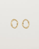 Front view of the Petite Dalí Earrings in yellow gold.