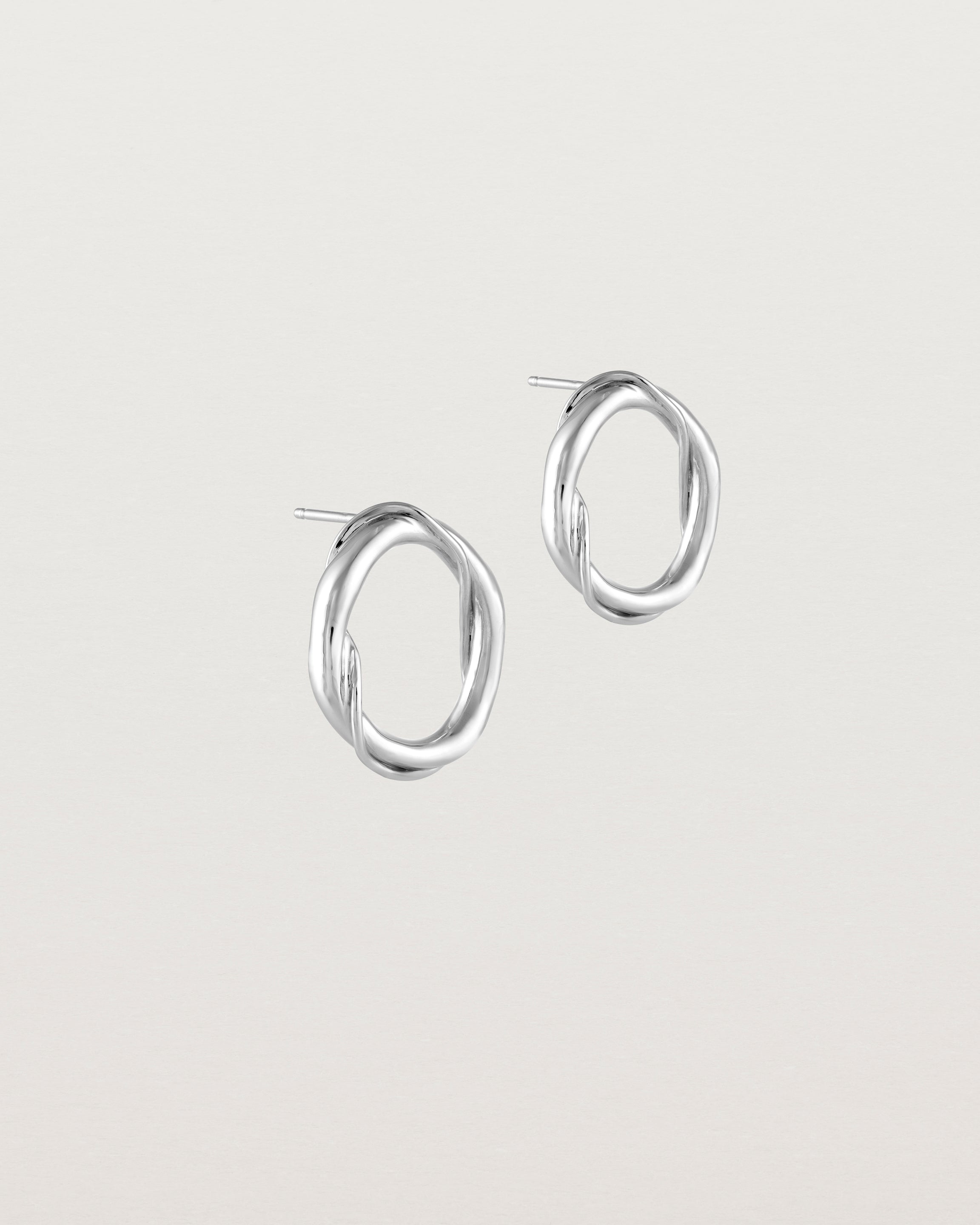 Angled view of the Petite Dalí Earrings in sterling silver.