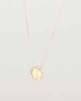 Angled view of the Petite Dotted Mana Necklace | Yellow Gold