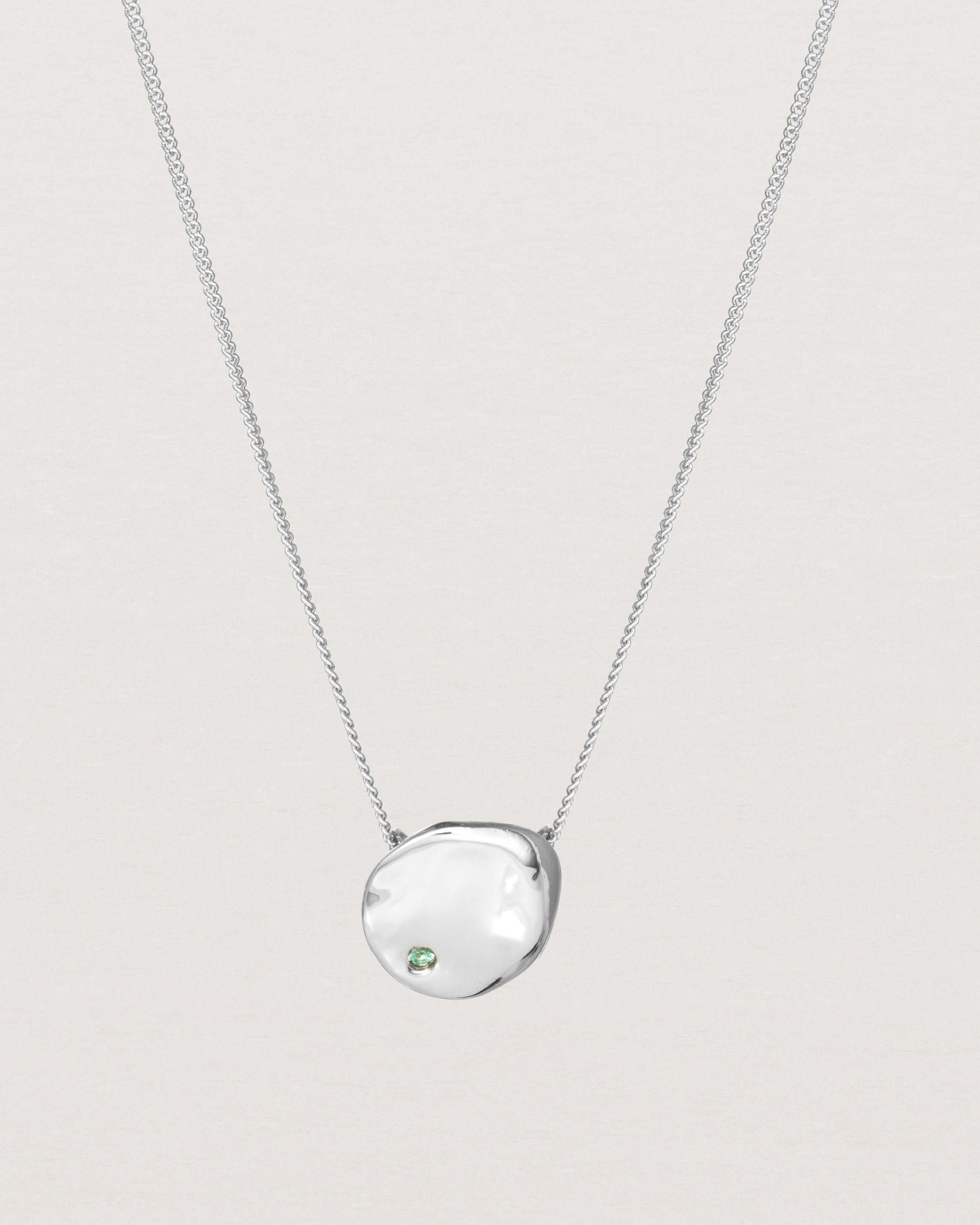 Front view of the Petite Mana Necklace in sterling silver. stone _label: Accent Stone Example