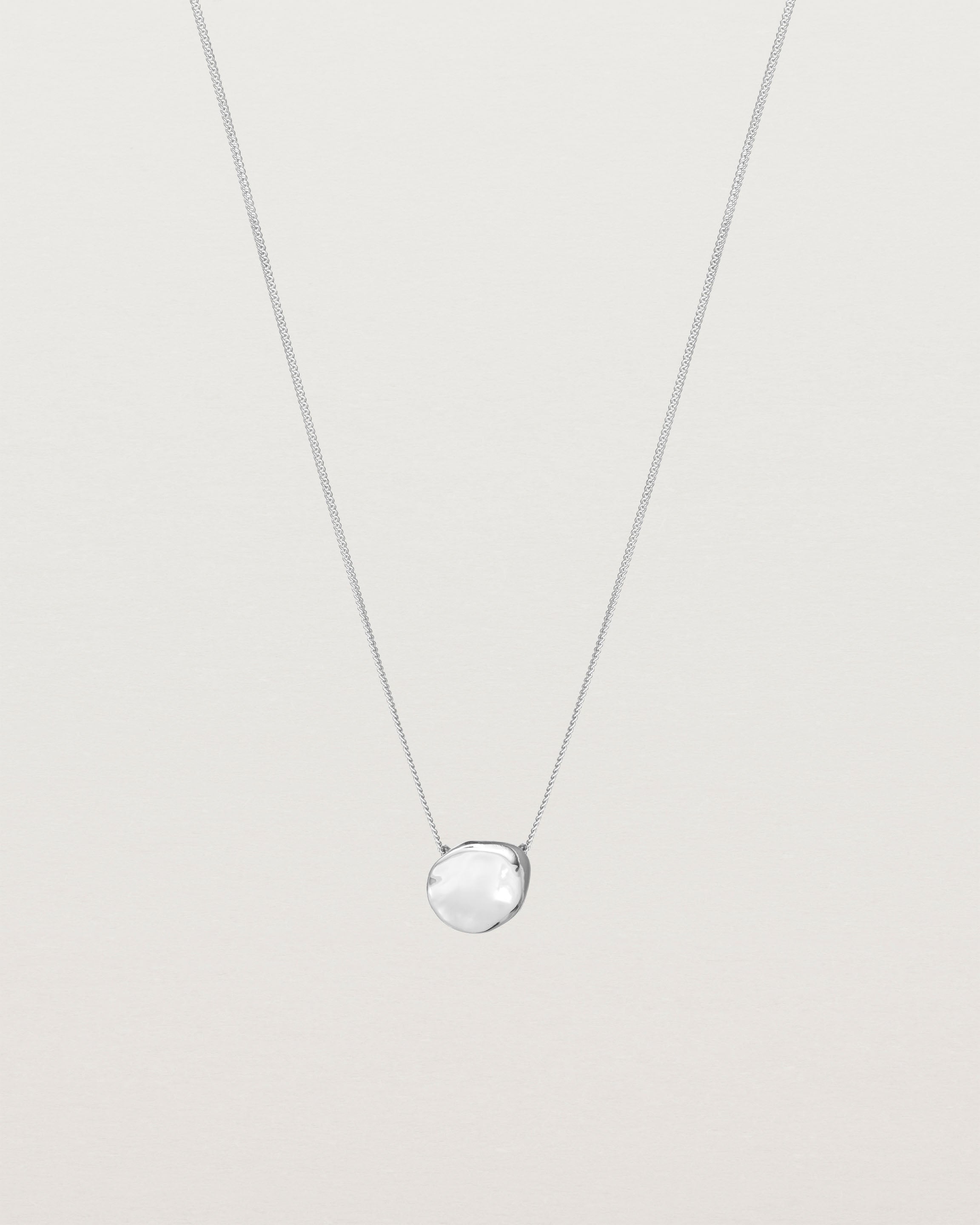 Front view of the Petite Mana Necklace in sterling silver.