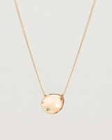 Front view of the Petite Mana Necklace in rose gold. stone _label: Accent Stone Example
