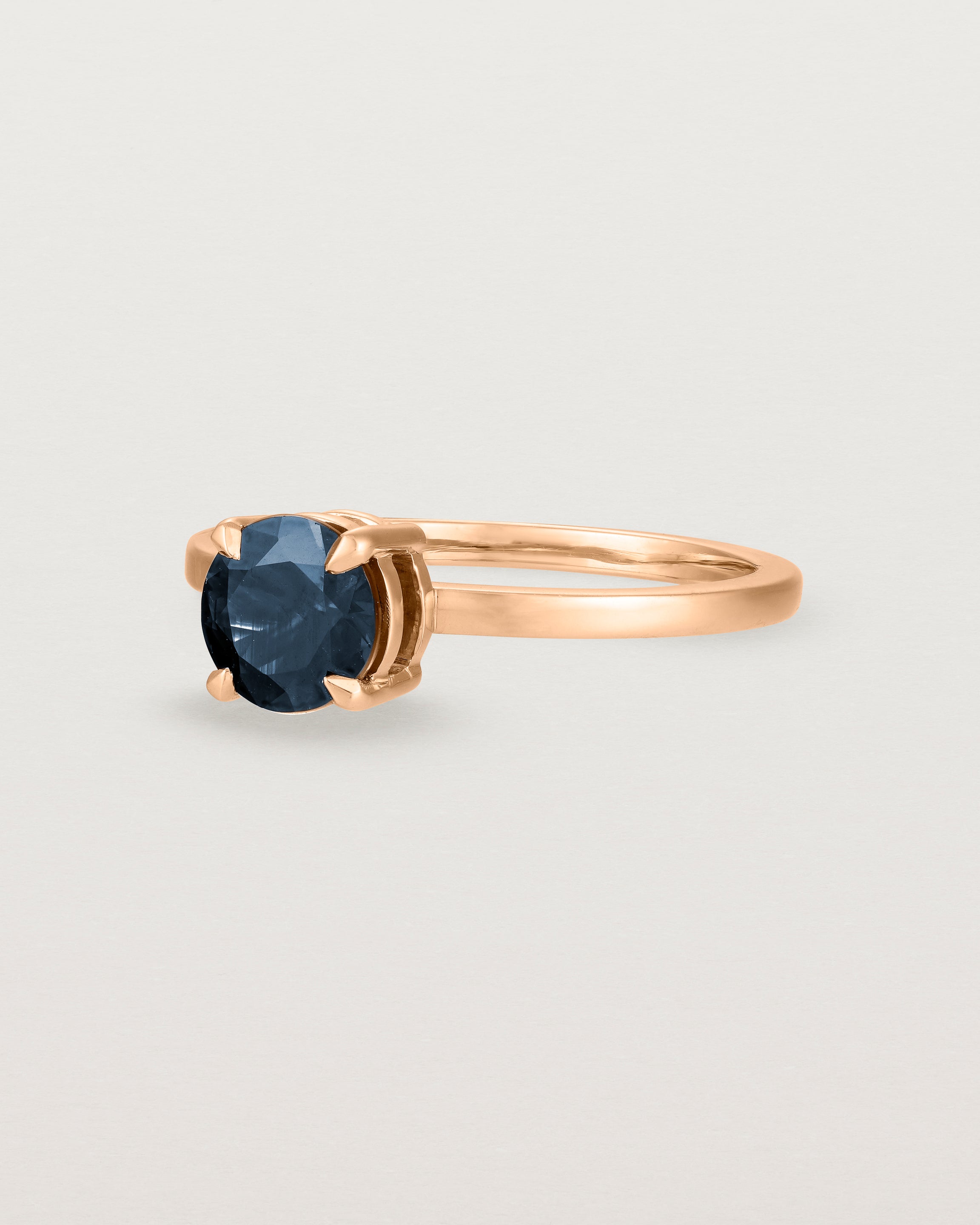 Angled view of the Petite Una Round Solitaire | Australian Sapphire | Rose Gold.
