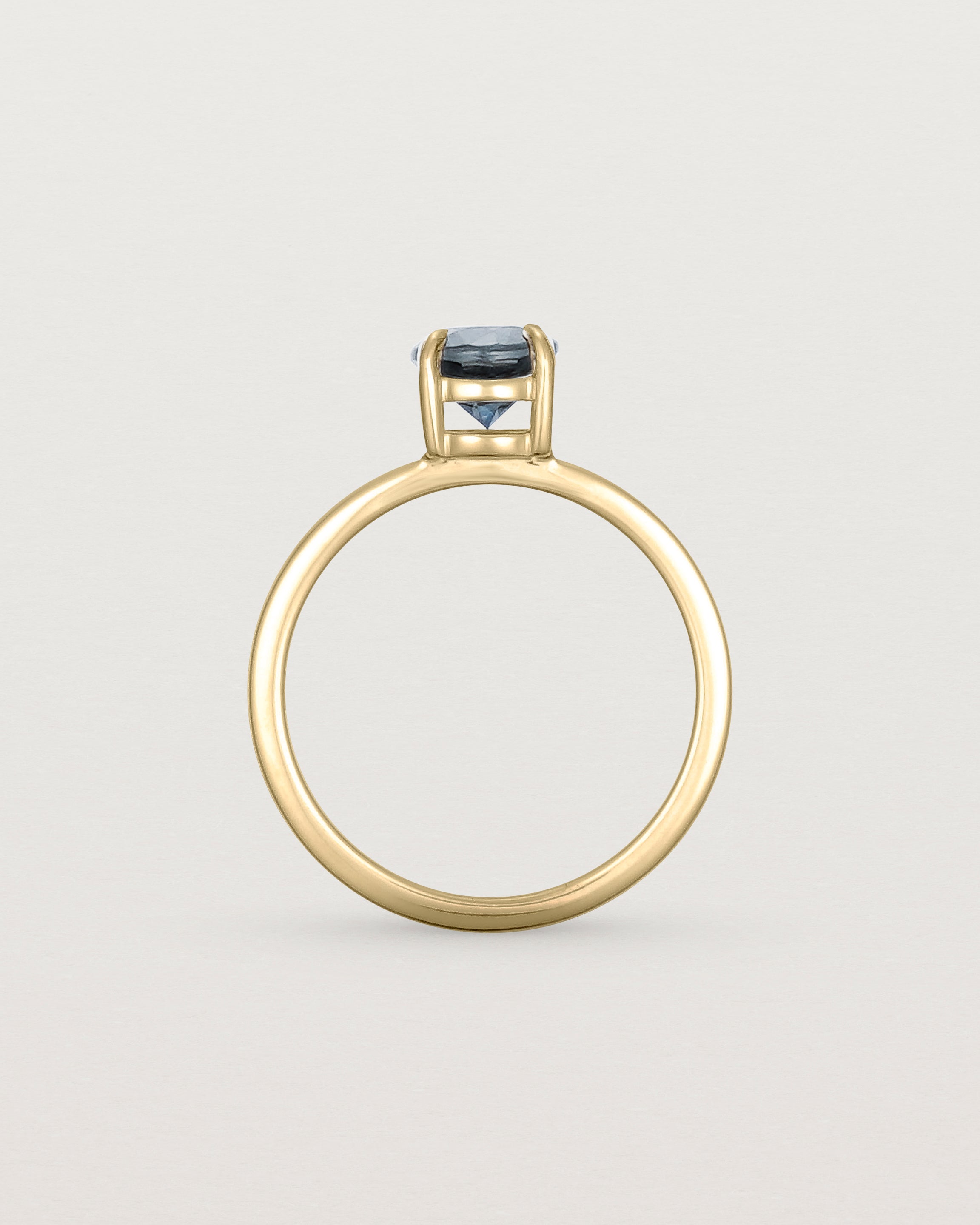 Standing view of the Petite Una Round Solitaire | Australian Sapphire | Yellow Gold.