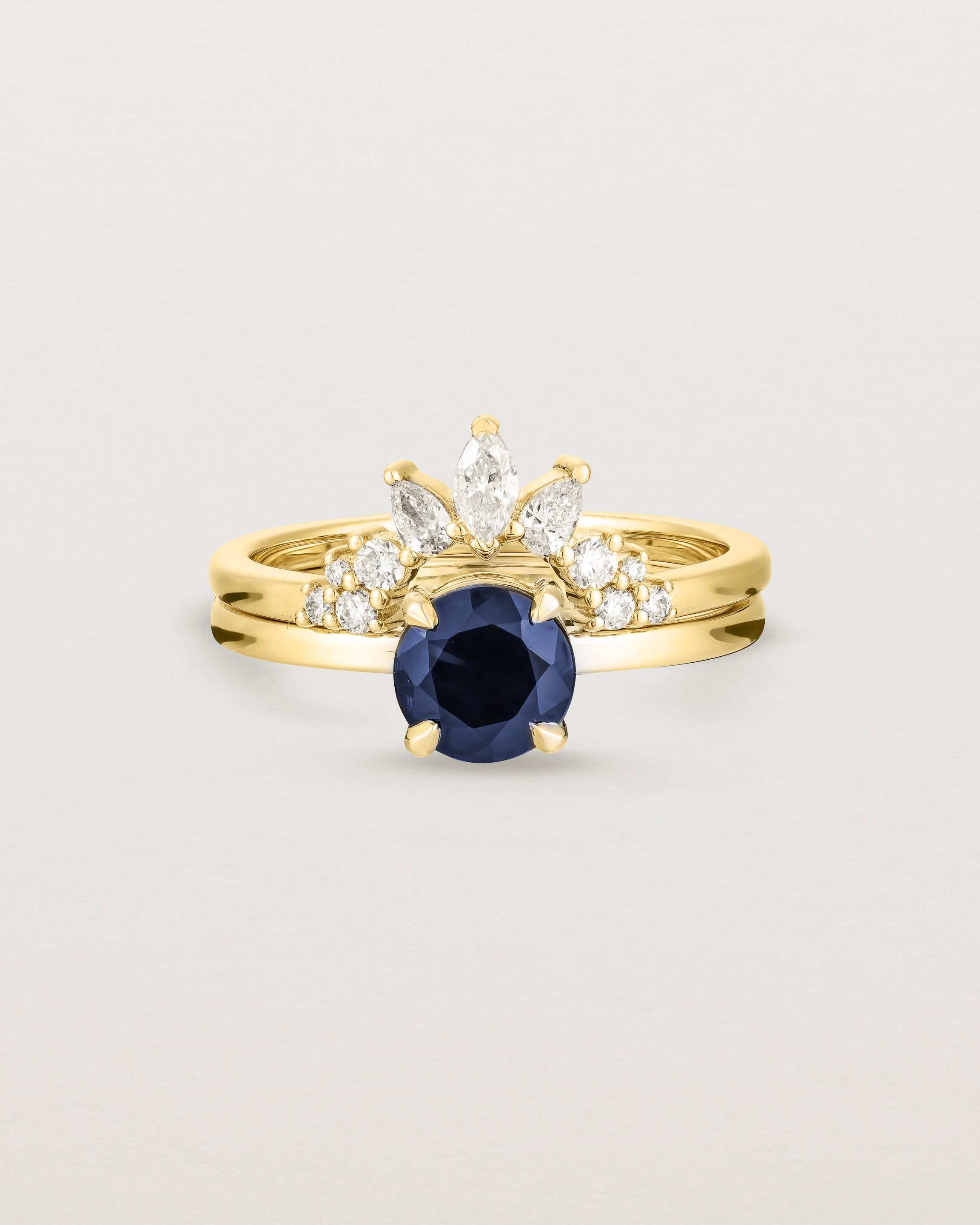 Front view of the Petite Una Round Solitaire | Australian Sapphire stacked with the Thalia Crown Ring | Diamonds in Yellow Gold.