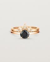 Front view of the Petite Una Round Solitaire | Black Spinel | Rose Gold stacked with the Meia Crown Ring | Diamonds
