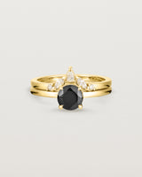Front view of the Petite Una Round Solitaire | Black Spinel | Yellow Gold stacked with the Meia Crown Ring | Diamonds
