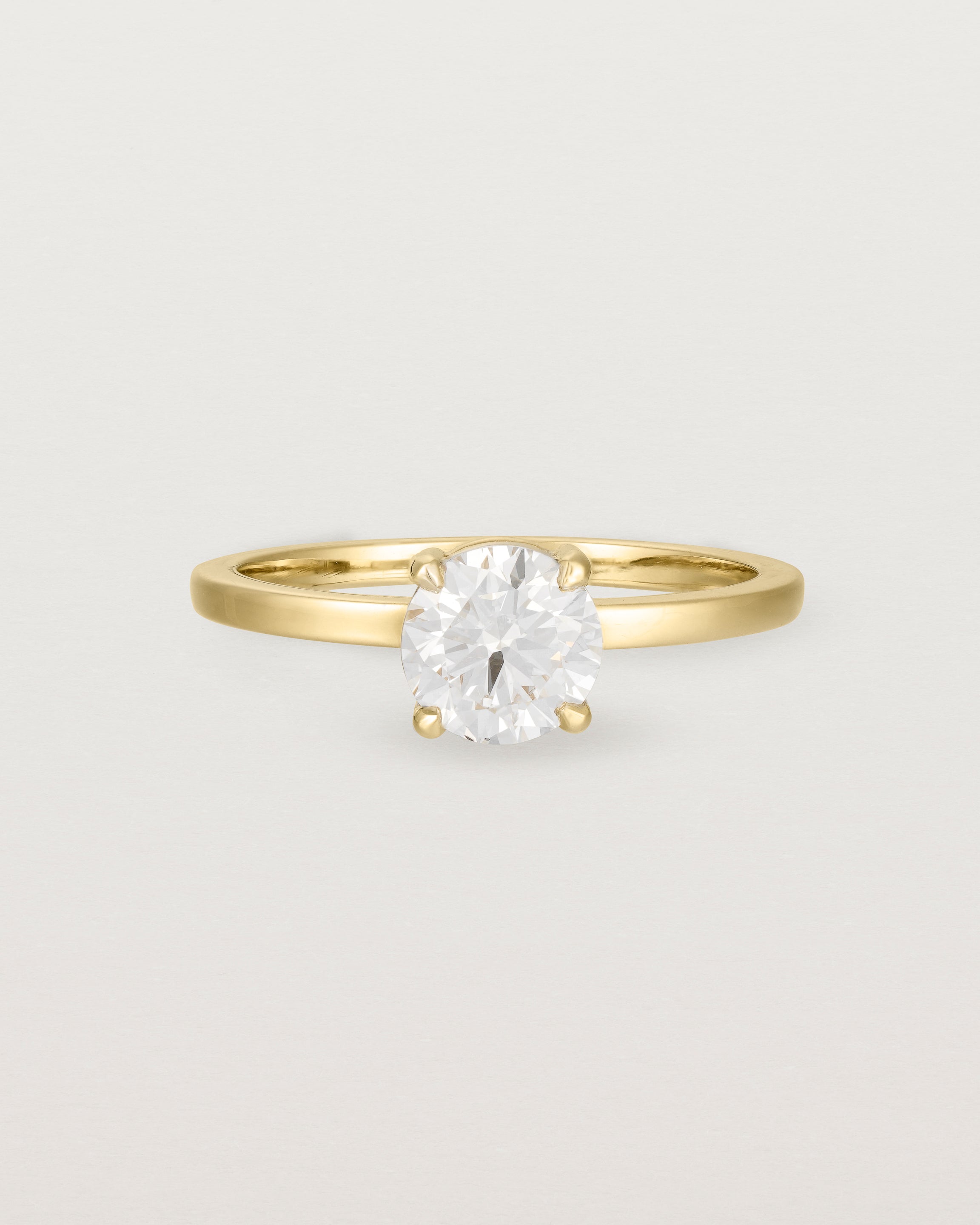 Front view of the Petite Una Round Solitaire | Laboratory Grown Diamond | Yellow Gold.