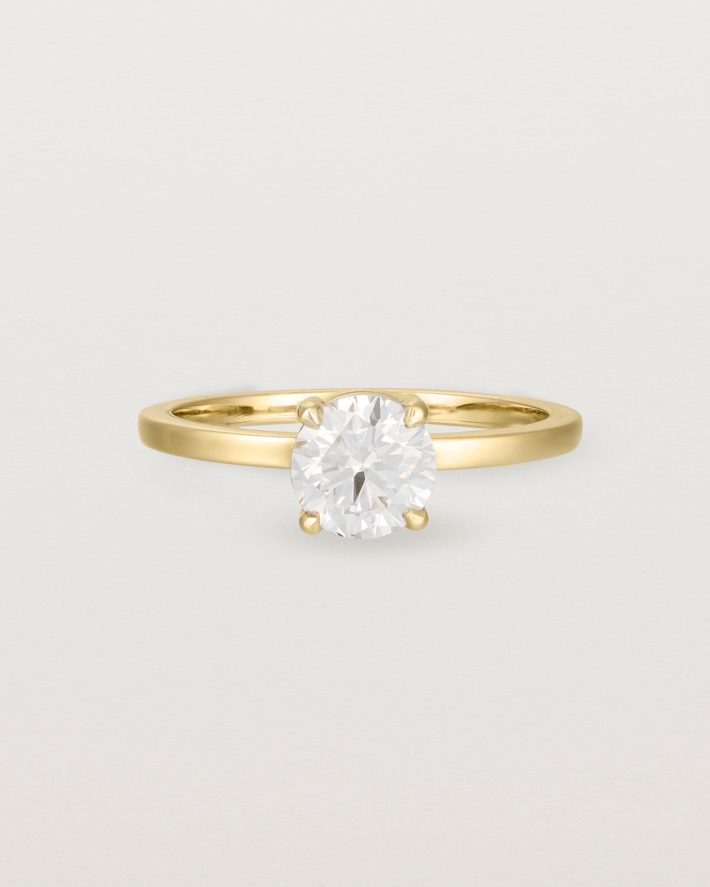 Front view of the Petite Una Round Solitaire | Laboratory Grown Diamond | Yellow Gold.