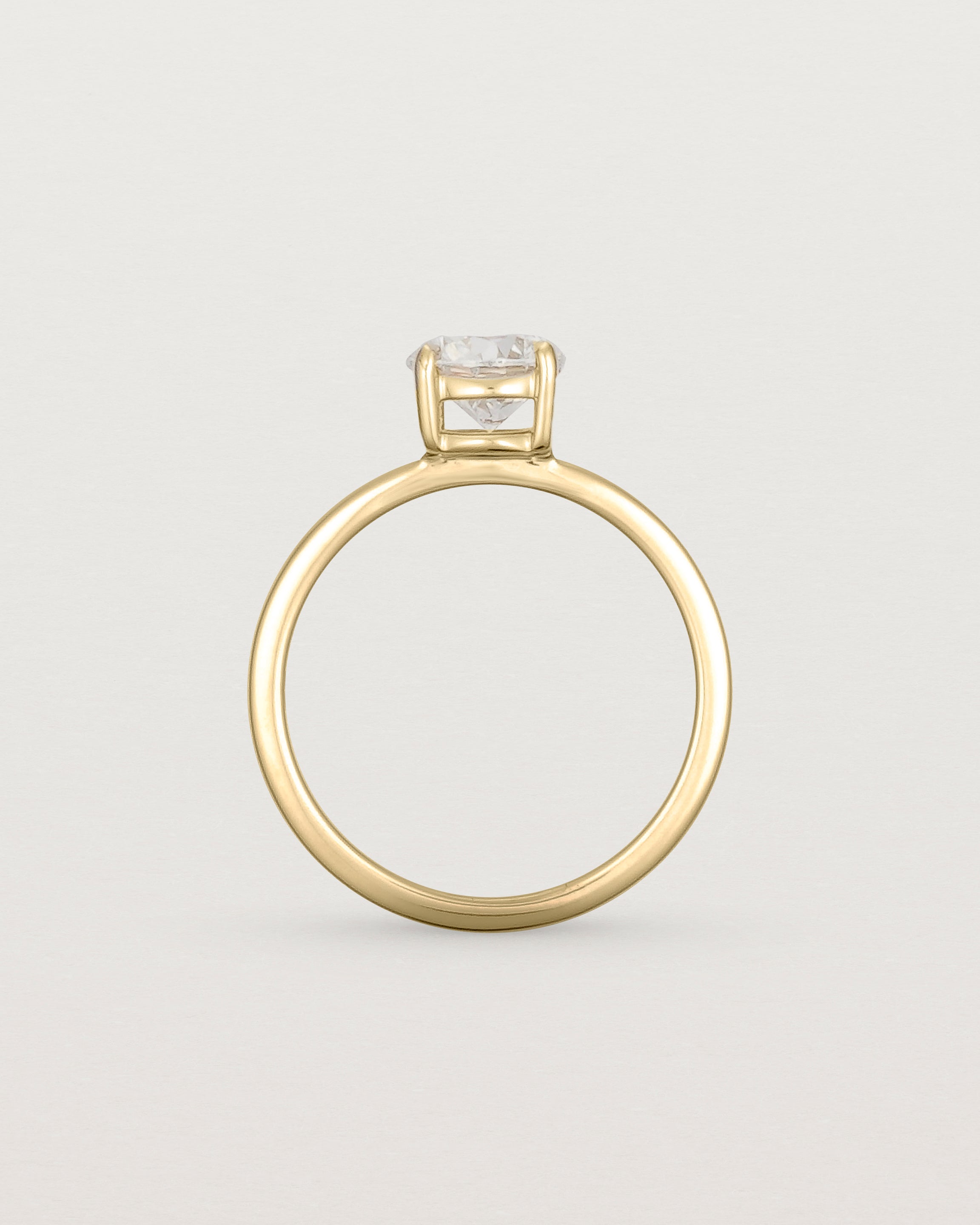 Standing view of the Petite Una Round Solitaire | Laboratory Grown Diamond | Yellow Gold.