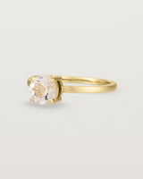 Angled view of the Petite Una Round Solitaire | Morganite | Yellow Gold.