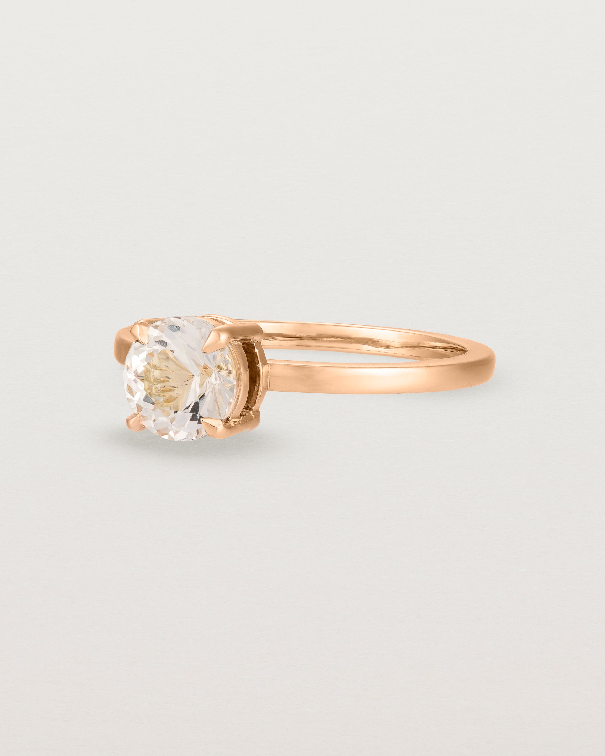 Angled view of the Petite Una Round Solitaire | Morganite | Rose Gold.