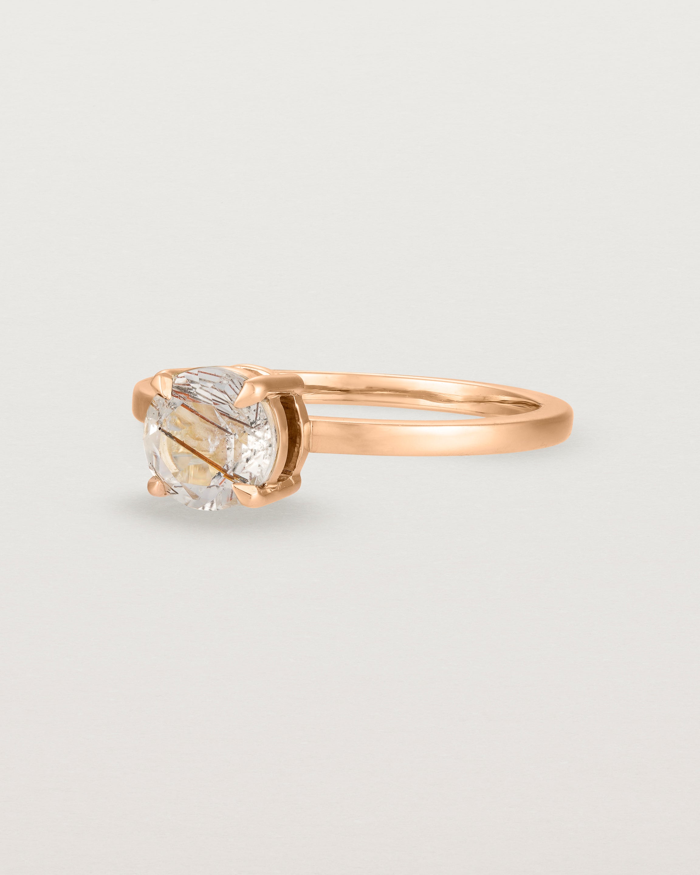 Angled view of the Petite Una Round Solitaire | Rutilated Quartz | Rose Gold.