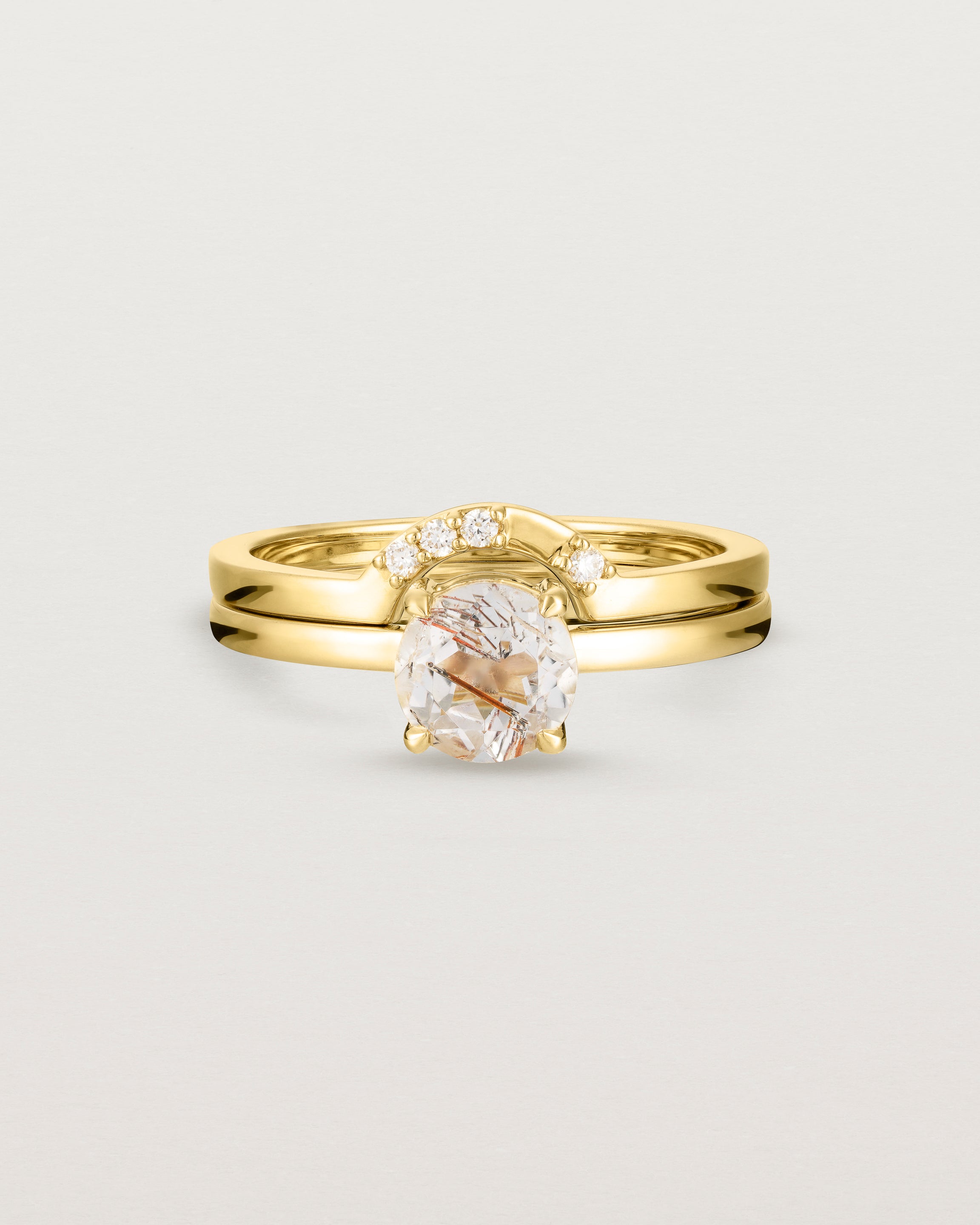 Front view of the Petite Una Round Solitaire | Rutilated Quartz | Yellow Gold stack with the Cecile Crown Ring | Diamond.
