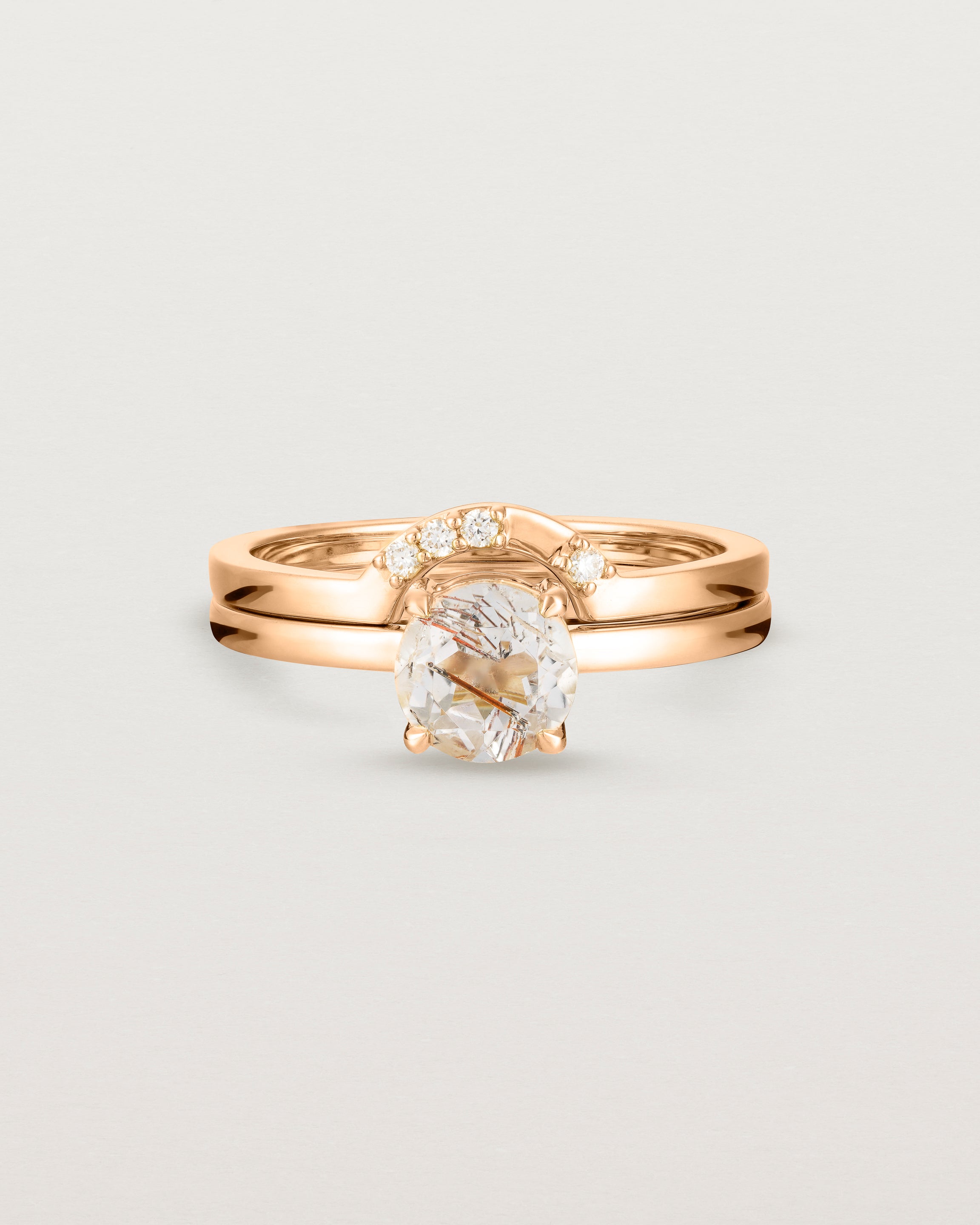 Front view of the Petite Una Round Solitaire | Rutilated Quartz | Rose Gold stack with the Cecile Crown Ring | Diamond. 