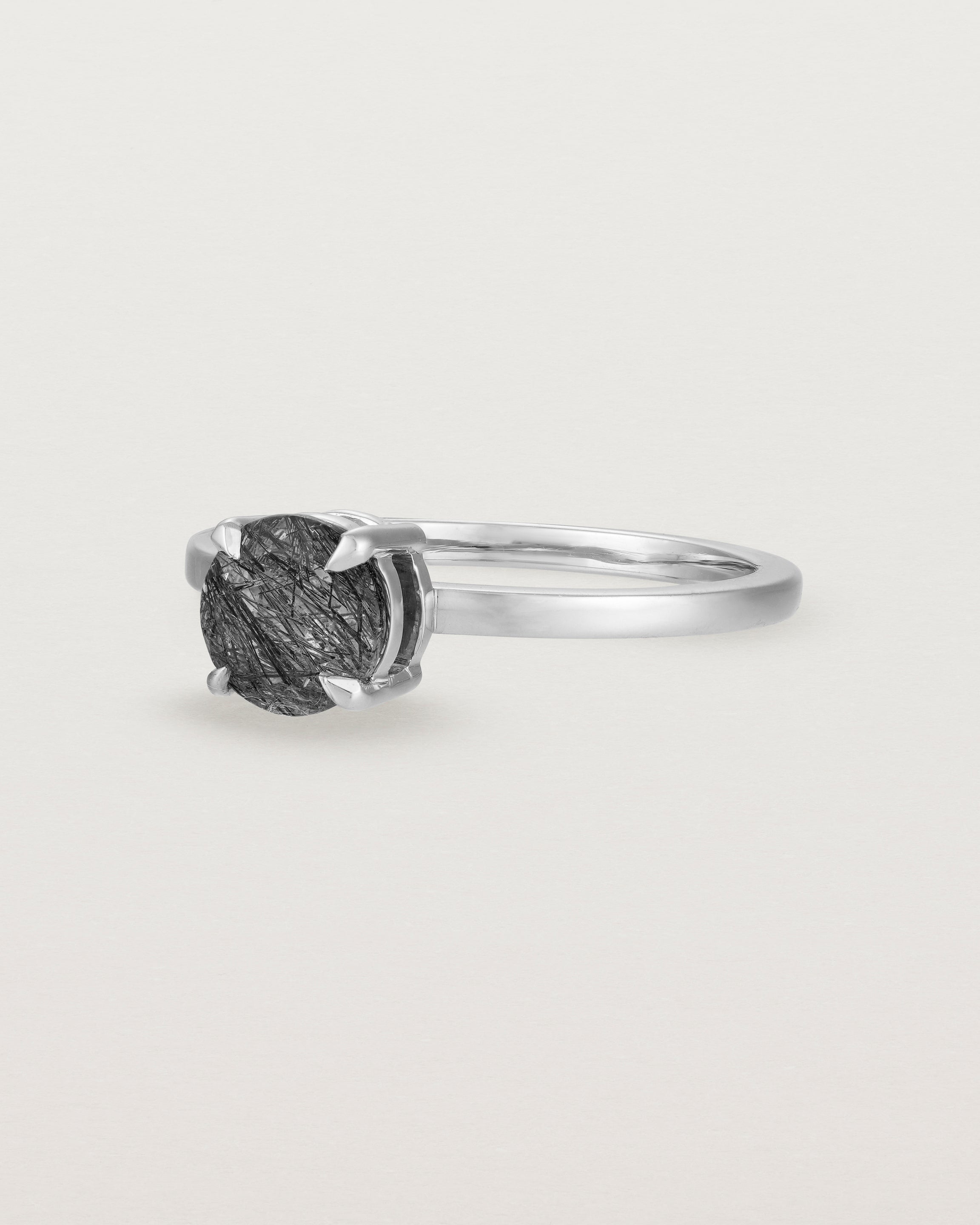 Angled view of the Petite Una Round Solitaire | Tourmalinated Quartz | White Gold.