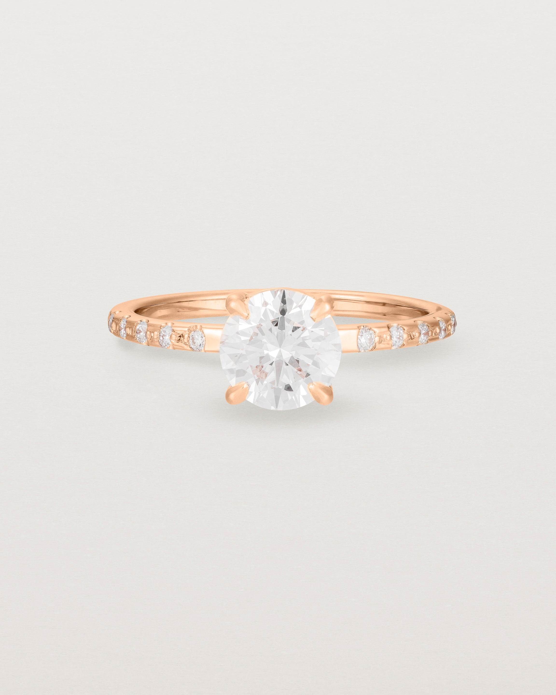 Front view of the Petite Una Round Solitaire | Laboratory Grown Diamond | Rose Gold with Cascade Shoulders.