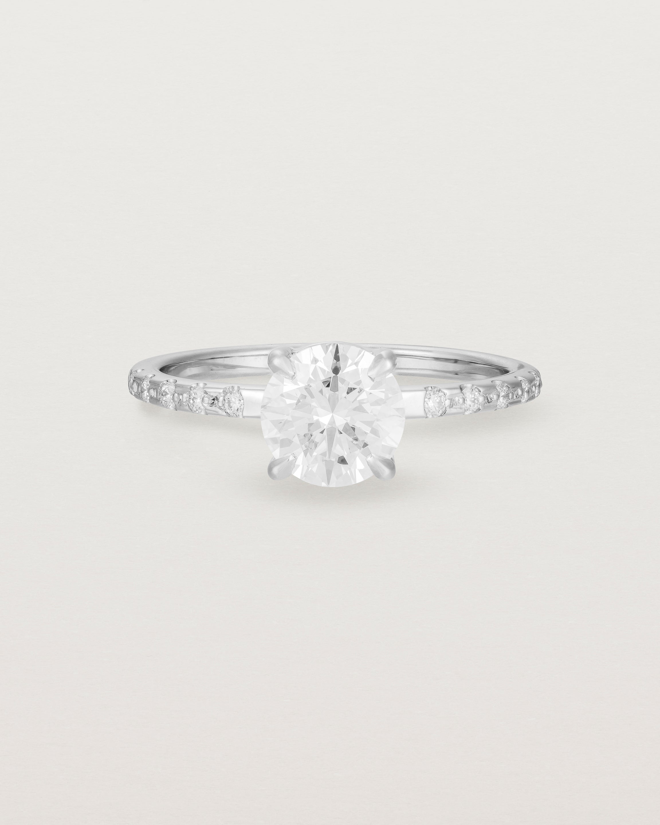 Front view of the Petite Una Round Solitaire | Laboratory Grown Diamond | White Gold with Cascade Shoulders.