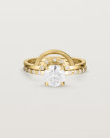 Front view of the Petite Una Round Solitaire | Laboratory Grown Diamond | Yellow Gold with Cascade Shoulders stacked with the Evette Crown Ring | Diamonds. 