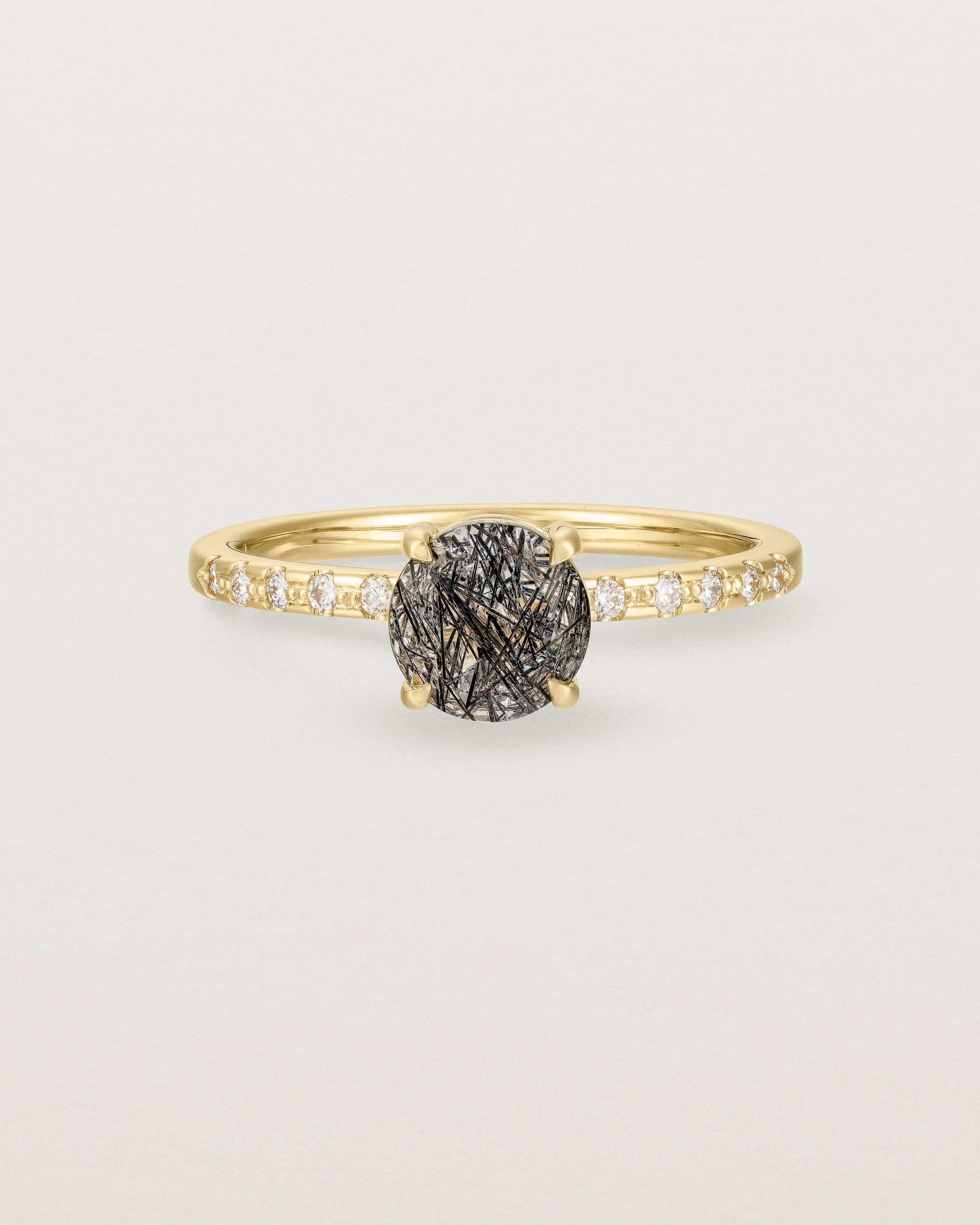 Front view of the Petite Una Round Solitaire | Tourmalinated Quartz | Yellow Gold with Cascade Shoulders.
