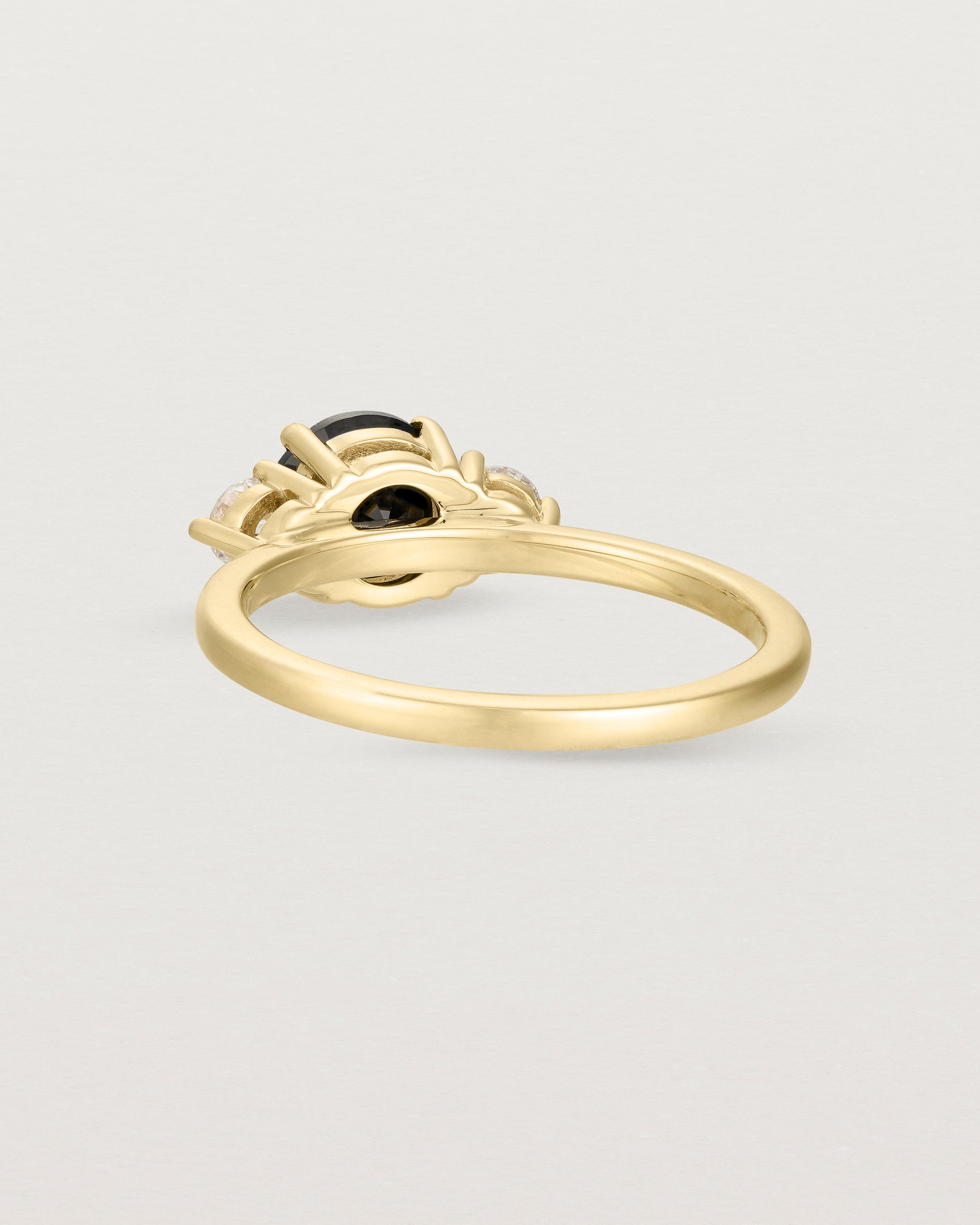 Back view of the Petite Una Round Trio Ring | Black Spinel & Diamonds | Yellow Gold.