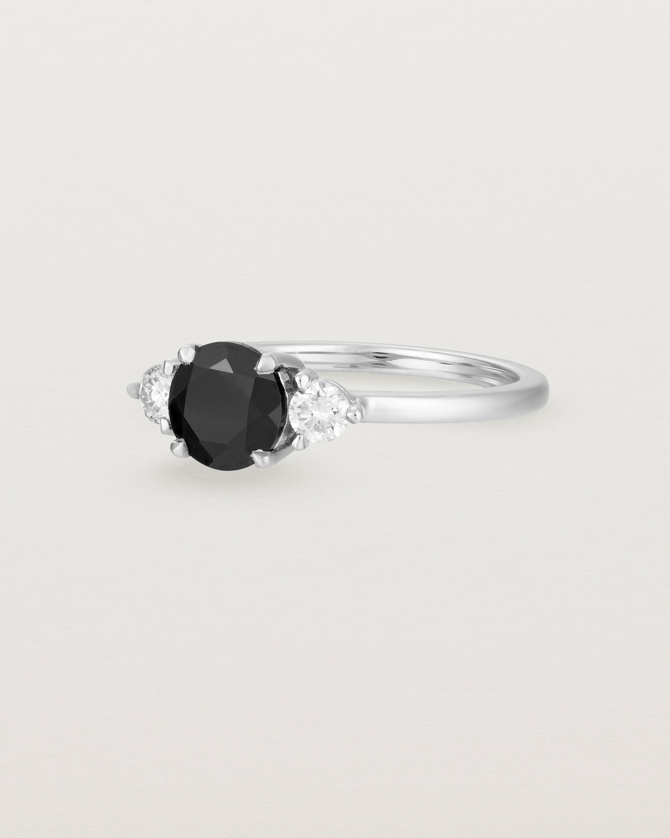 Angled view of the Petite Una Round Trio Ring | Black Spinel & Diamonds | White Gold.