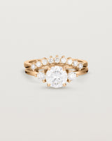 Front view of the Petite Una Round Trio Ring | Laboratory Grown Diamonds | Rose Gold with the Reina Crown Ring | Diamonds. 
