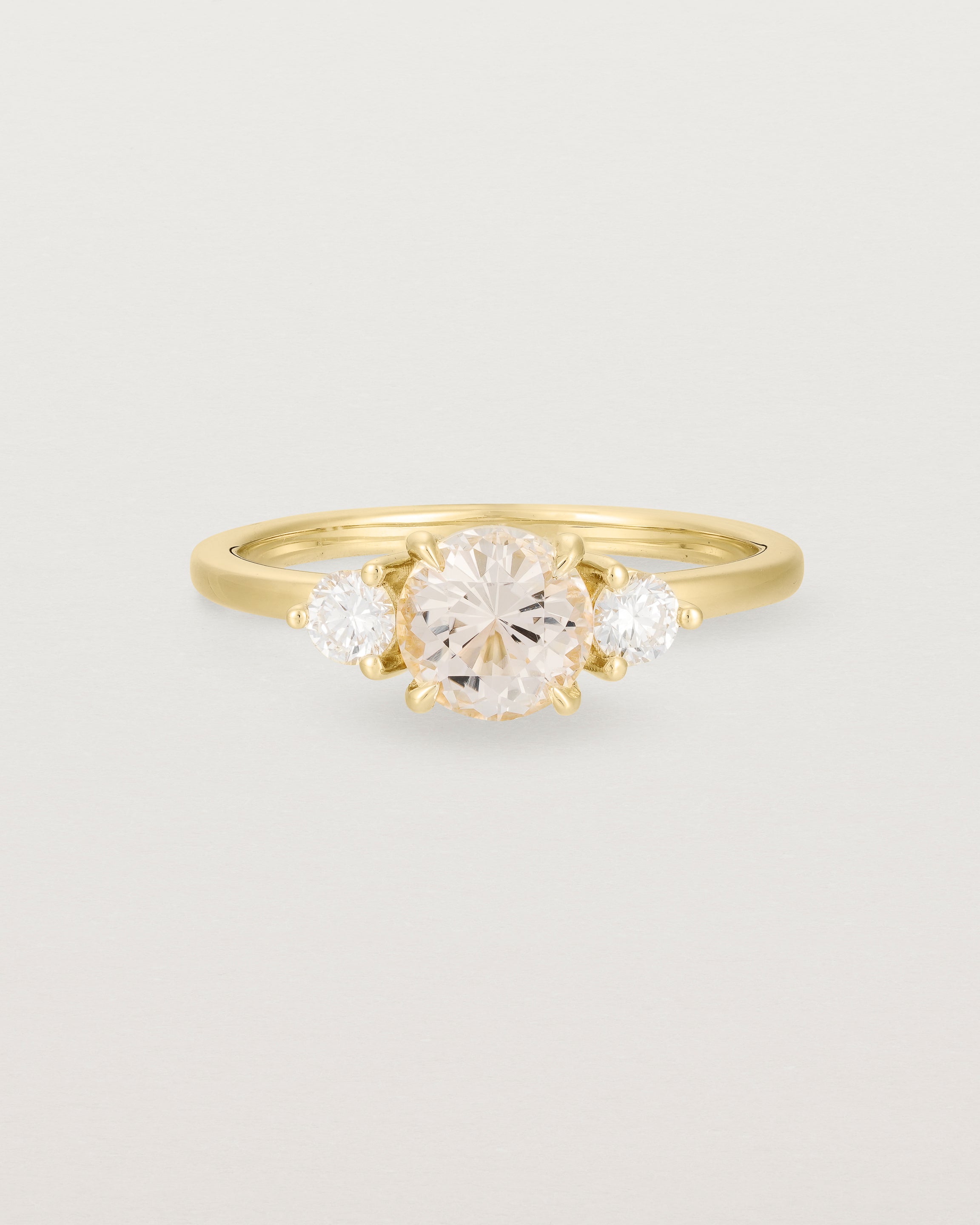 Front view of the Petite Una Round Trio Ring | Morganite & Diamonds | Yellow Gold.