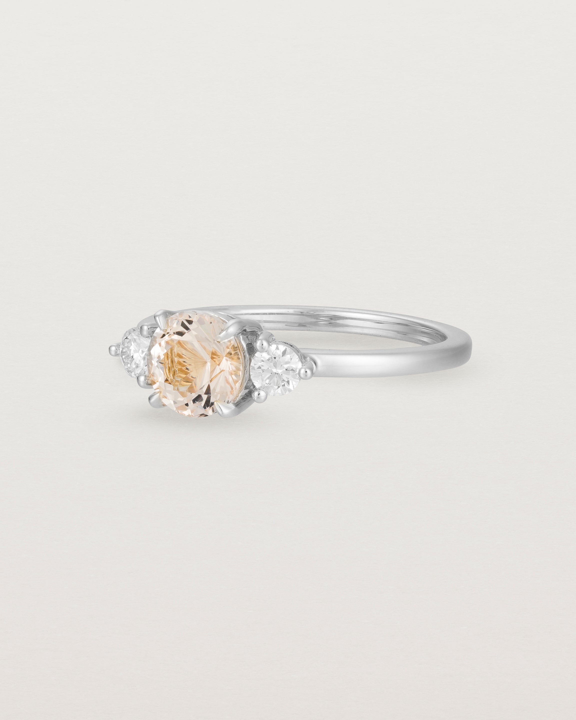 Angled view of the Petite Una Round Trio Ring | Morganite & Diamonds | White Gold.