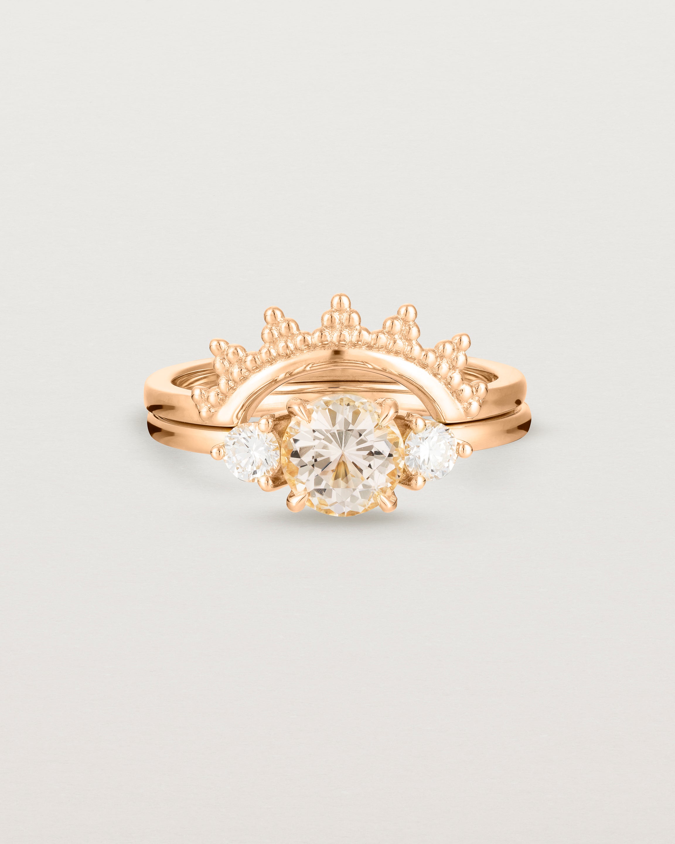 Front view of the Petite Una Round Trio Ring | Morganite & Diamonds | Rose Gold stacked with the Odine Crown Ring.