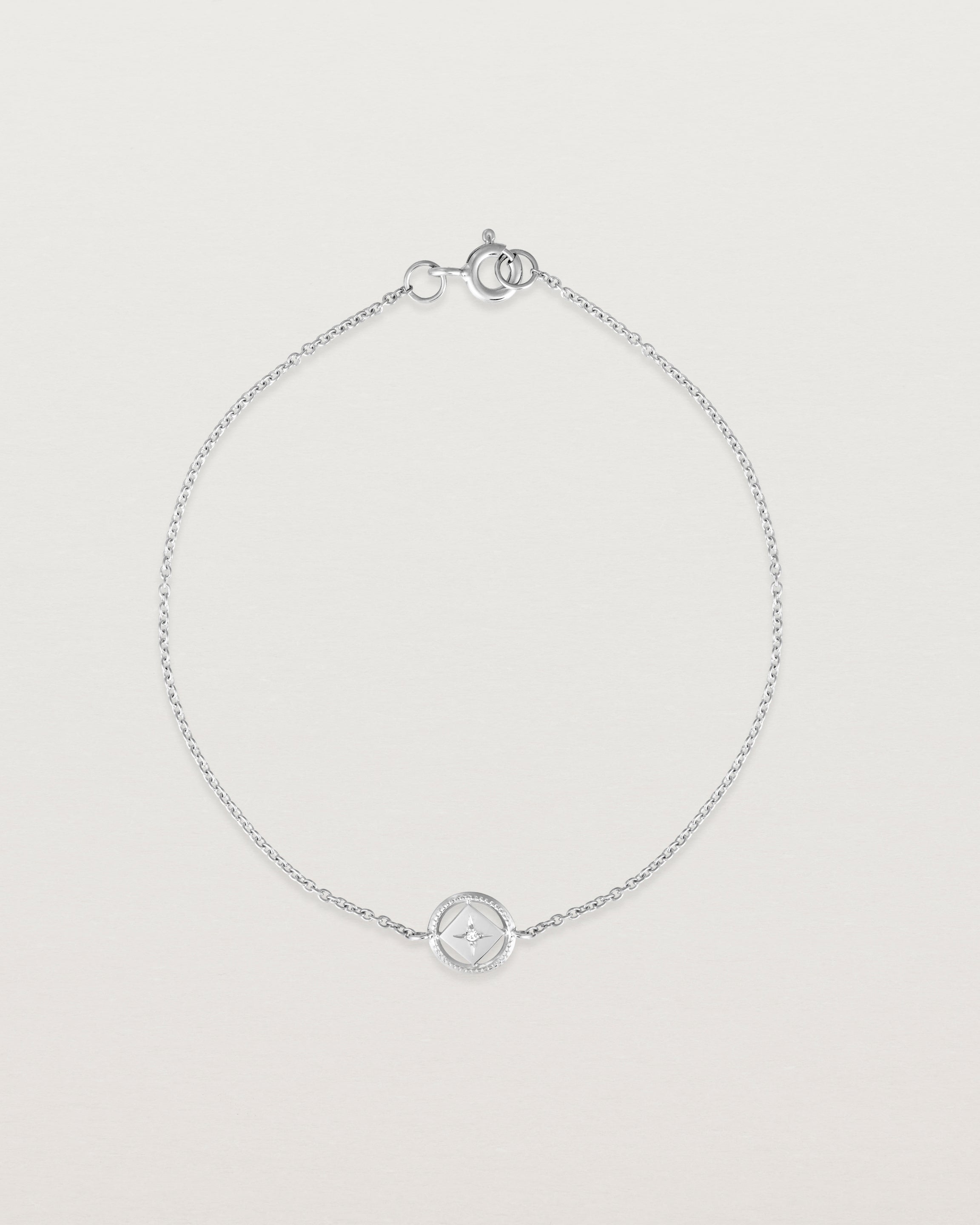 Full view of the Polaris Bracelet | Birthstone in white gold with a white diamond.