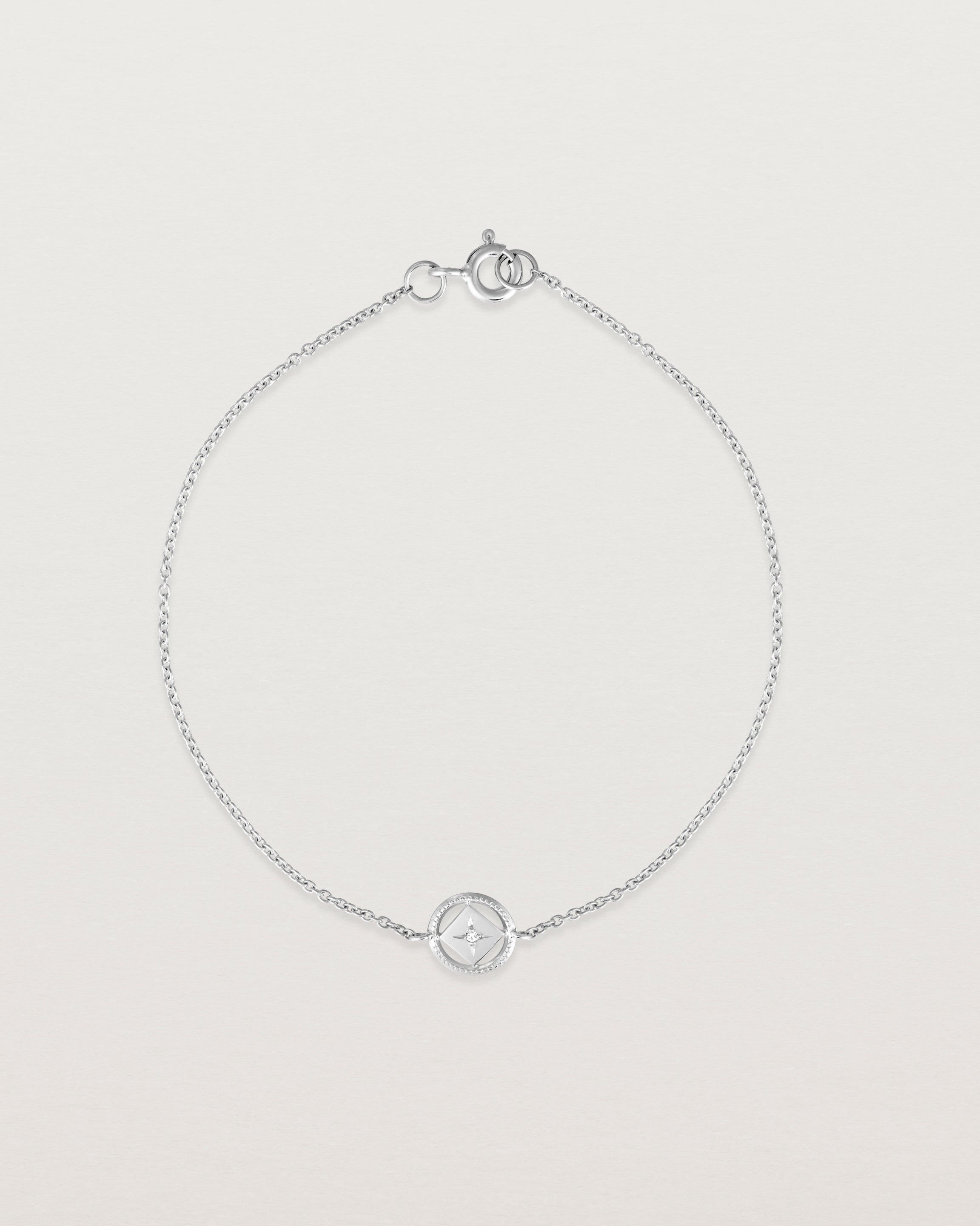 Full view of the Polaris Bracelet | Birthstone in sterling silver with a white diamond.