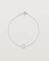 Full view of the Polaris Bracelet | Birthstone in sterling silver with a white diamond.