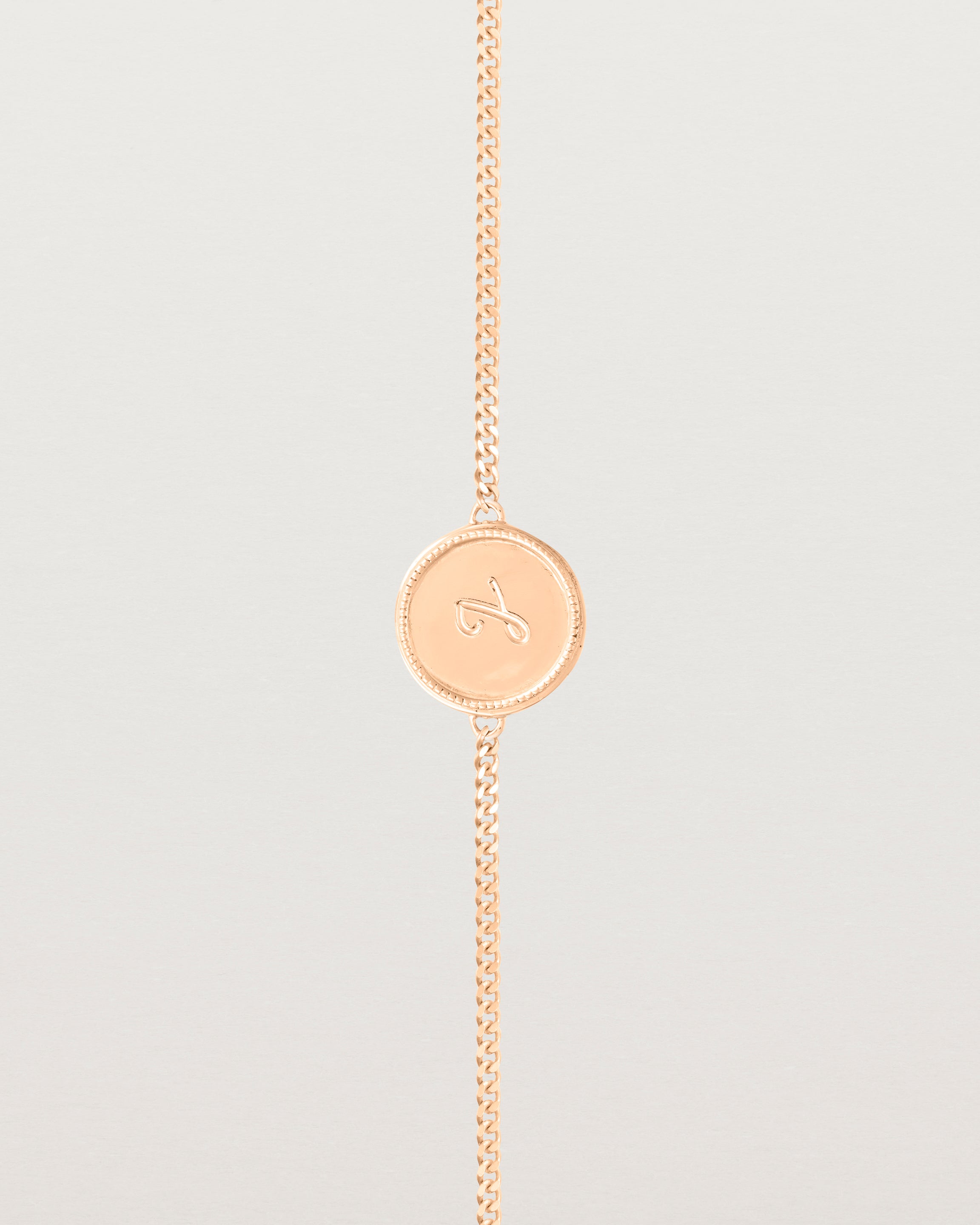 Close up view of the Precious Initial Bracelet in rose gold.