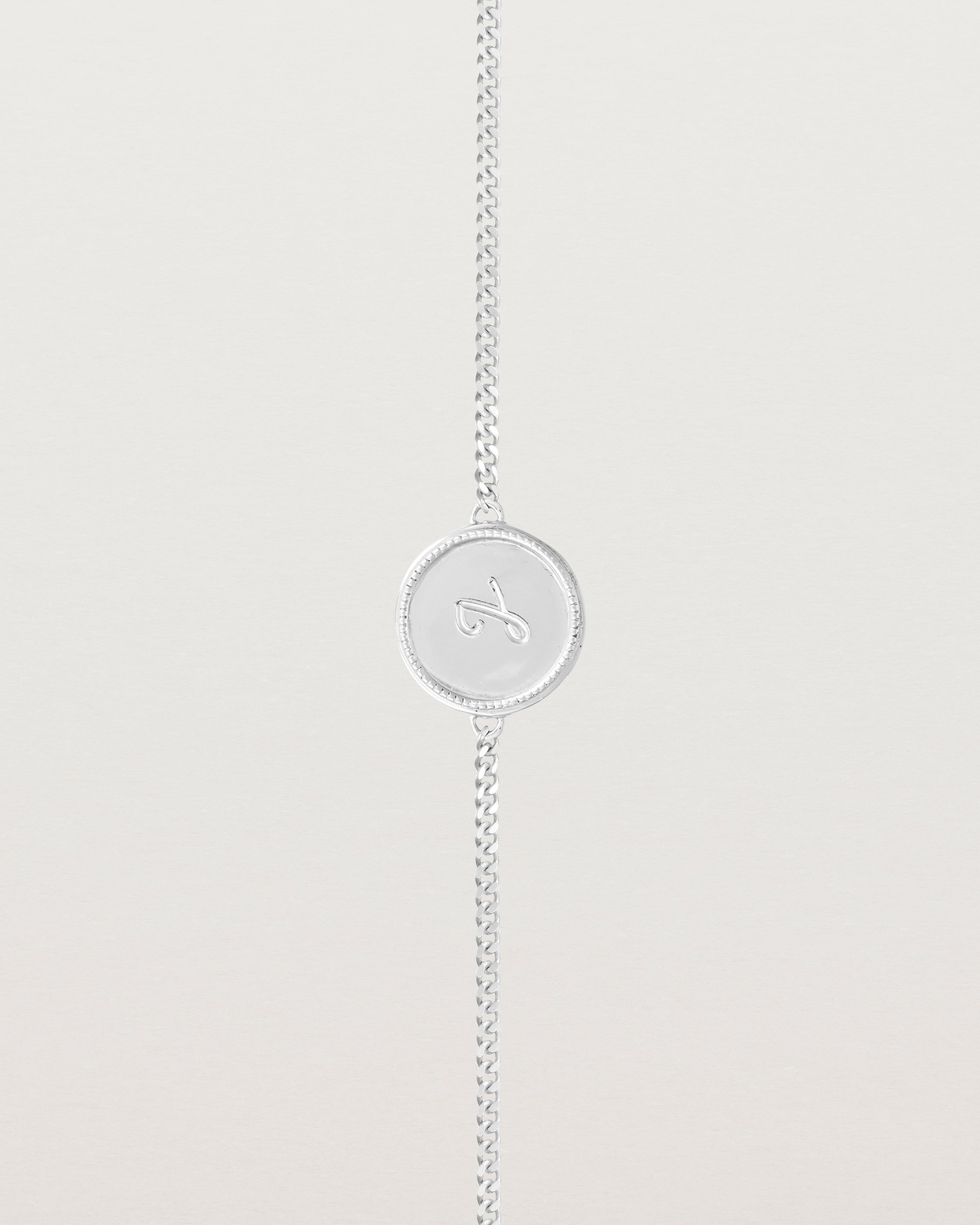 Close up view of the Precious Initial Bracelet in white gold.