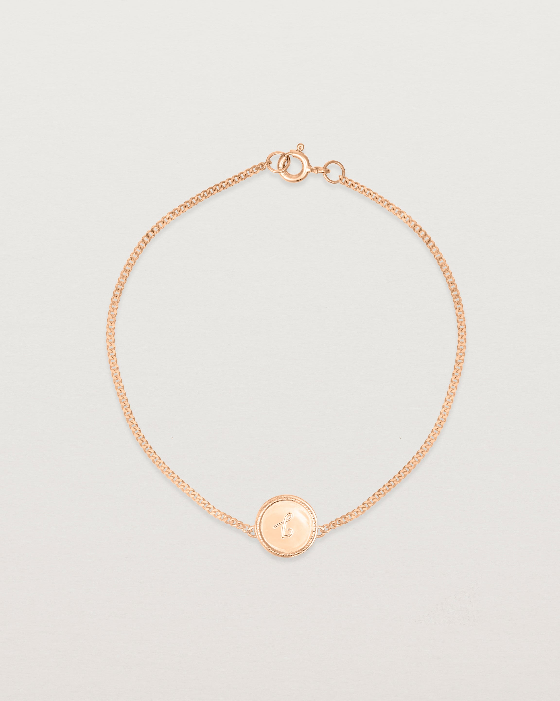 Top down view of the Precious Initial Bracelet in rose gold.