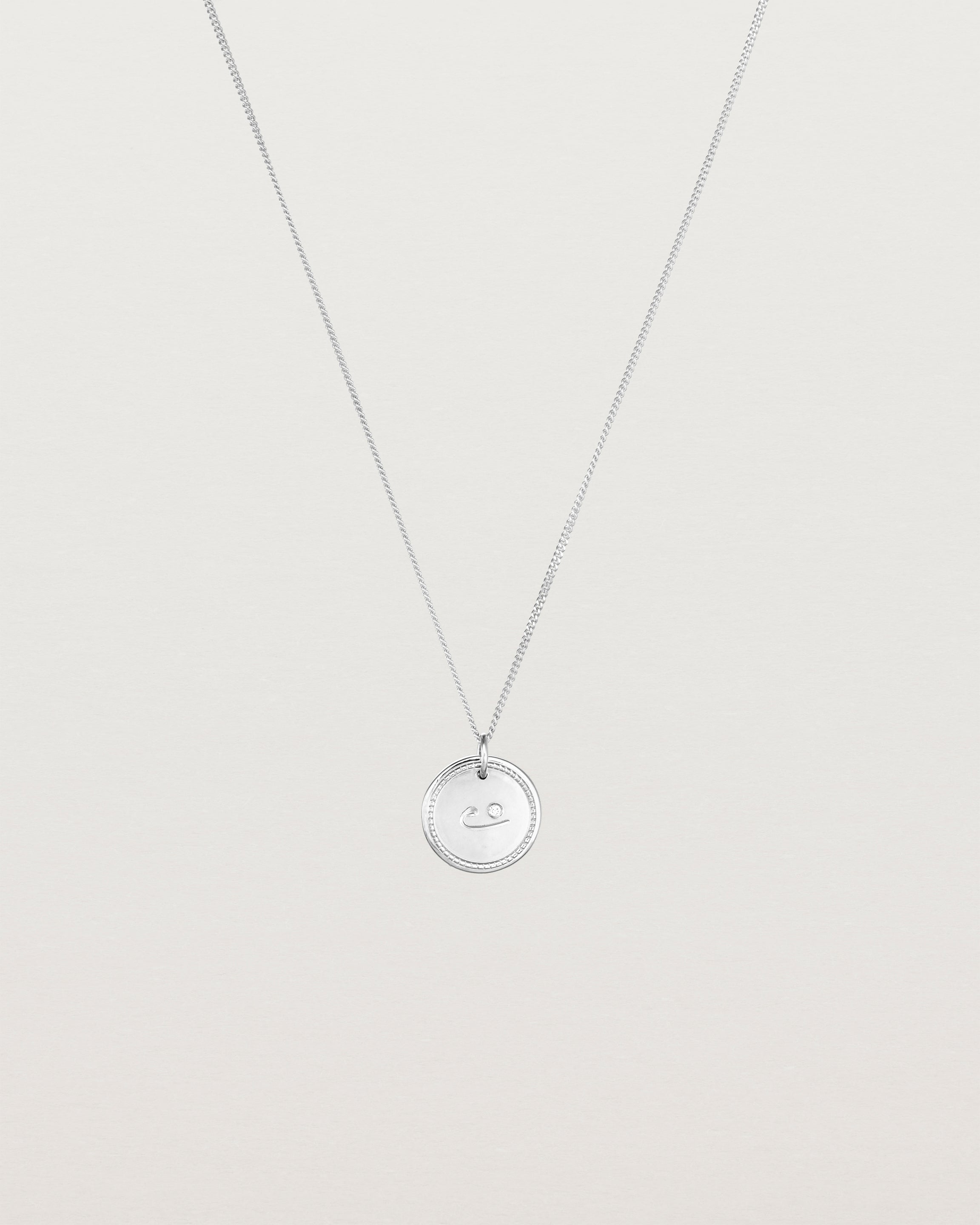 Front view of the Precious Initial Necklace | Birthstone in sterling silver.