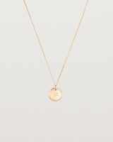 Front view of the Precious Initial Necklace | Birthstone in rose gold.