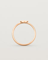 Standing view of the Precious Initial Ring in Rose Gold.
