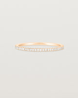A full rose gold band featuring white diamonds