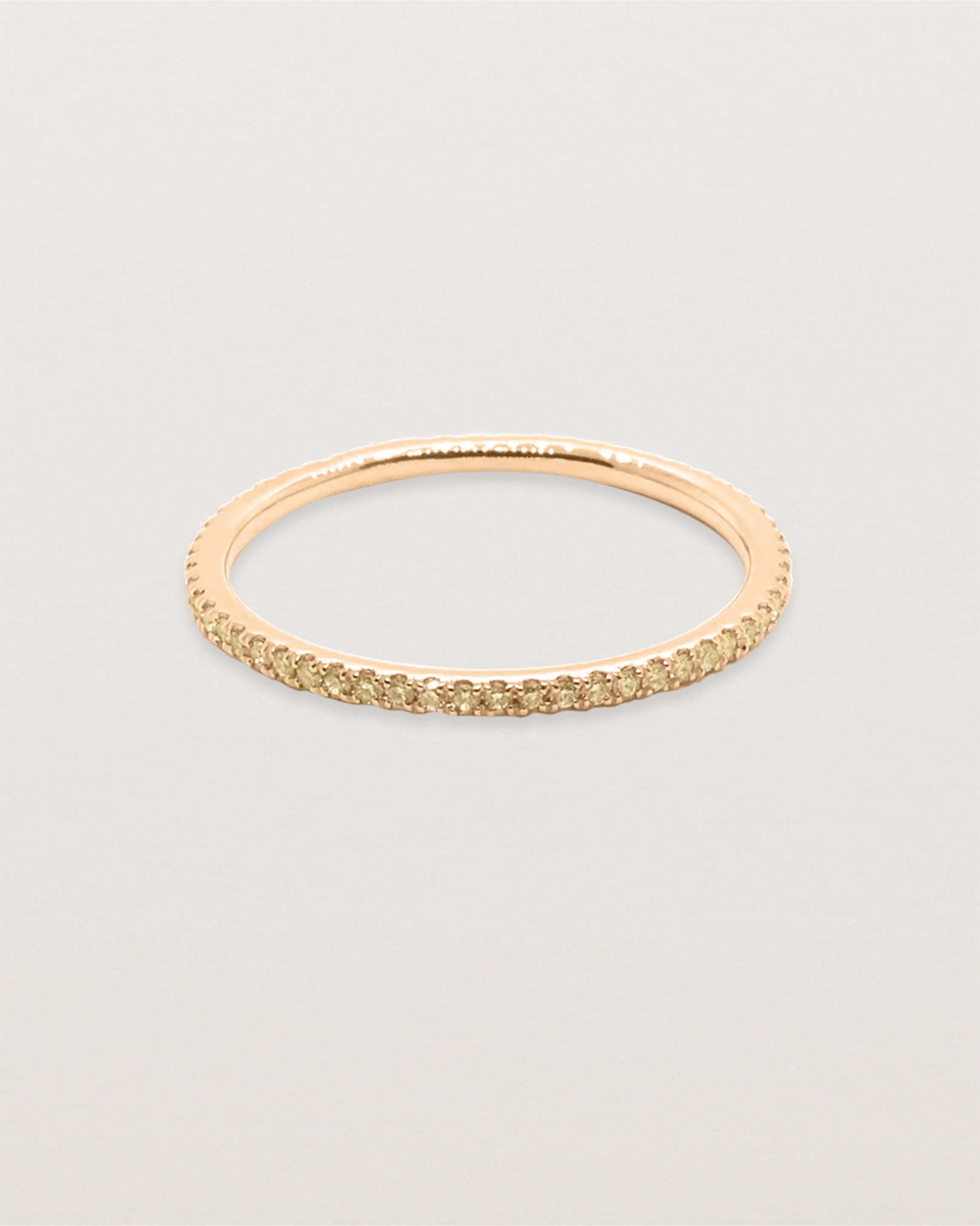Yellow gold band featuring pave set yellow champagne diamonds.