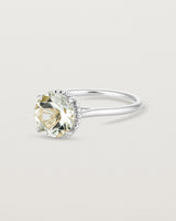 Angled view of the Thea Round Solitaire | Green Amethyst in white gold.