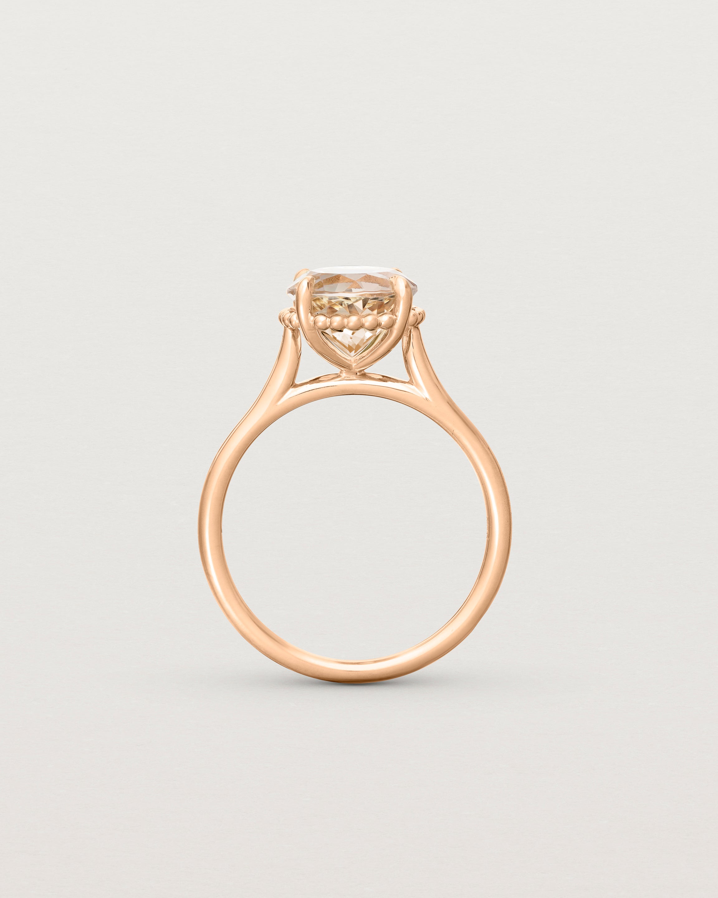 Standing view of the Thea Round Solitaire | Savannah Sunstone in rose gold.