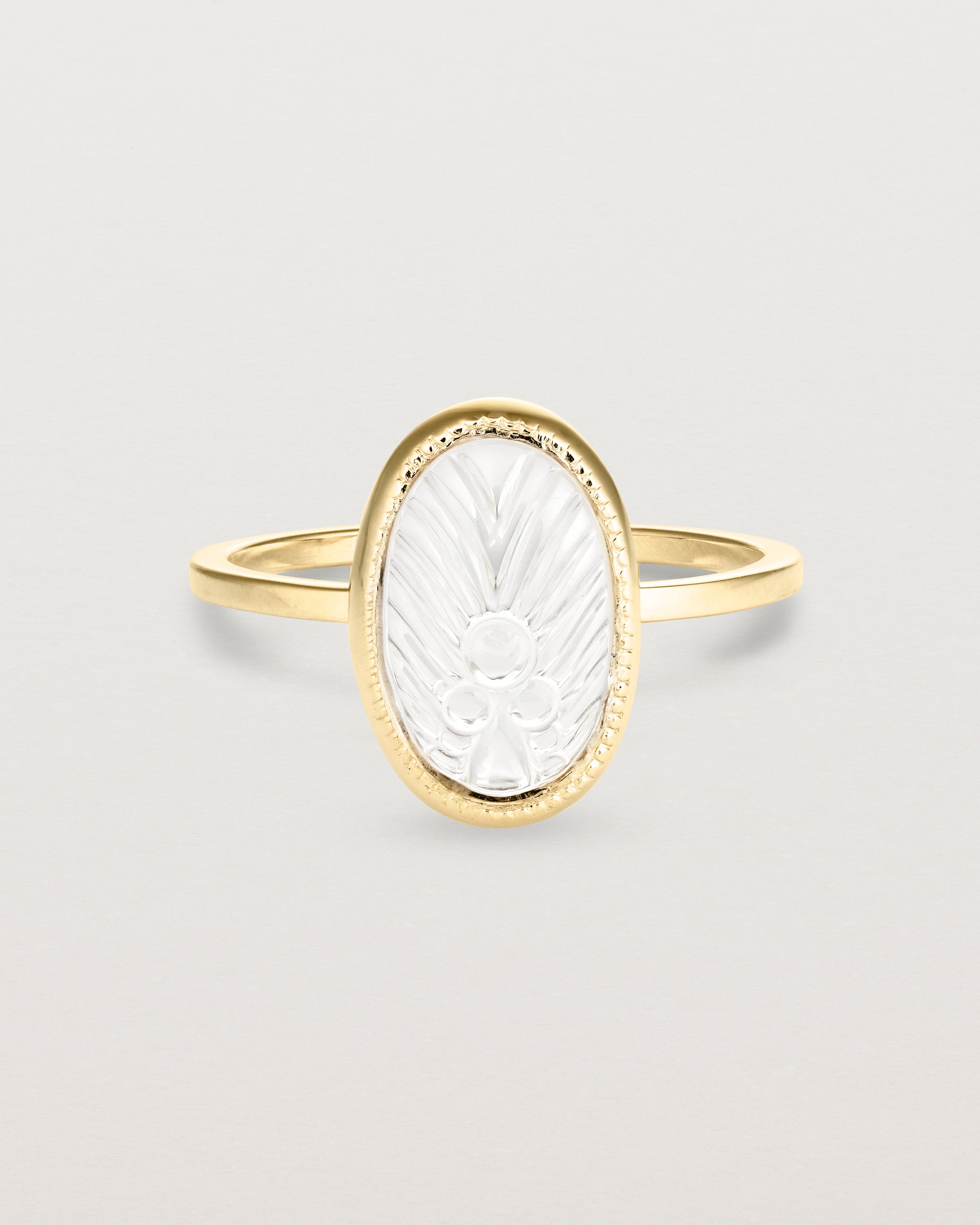 Front view of the Ruan Ring | Carved Quartz in yellow gold.