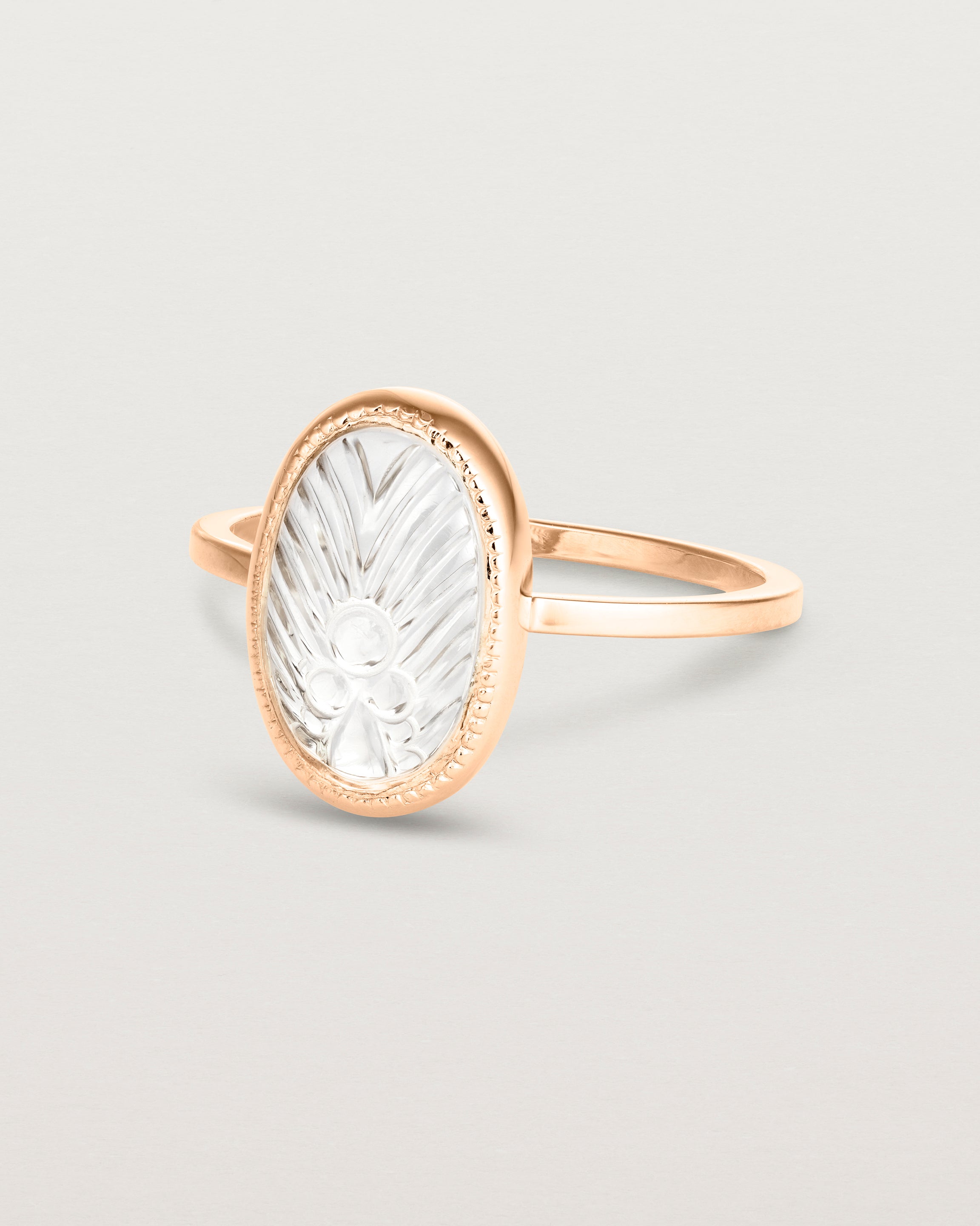 Angled view of the Ruan Ring | Carved Quartz in rose gold.