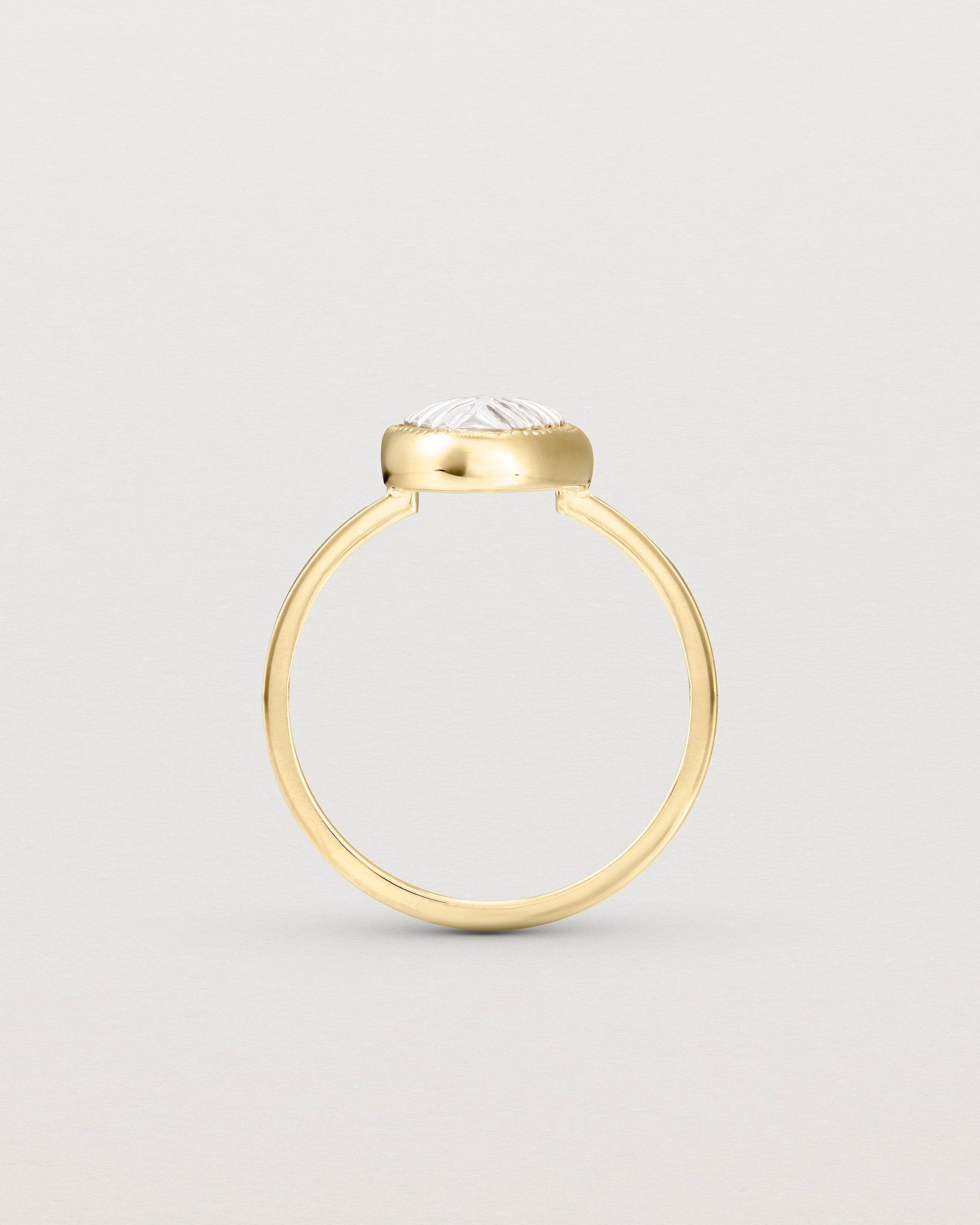 Standing view of the Ruan Ring | Carved Quartz in yellow gold.