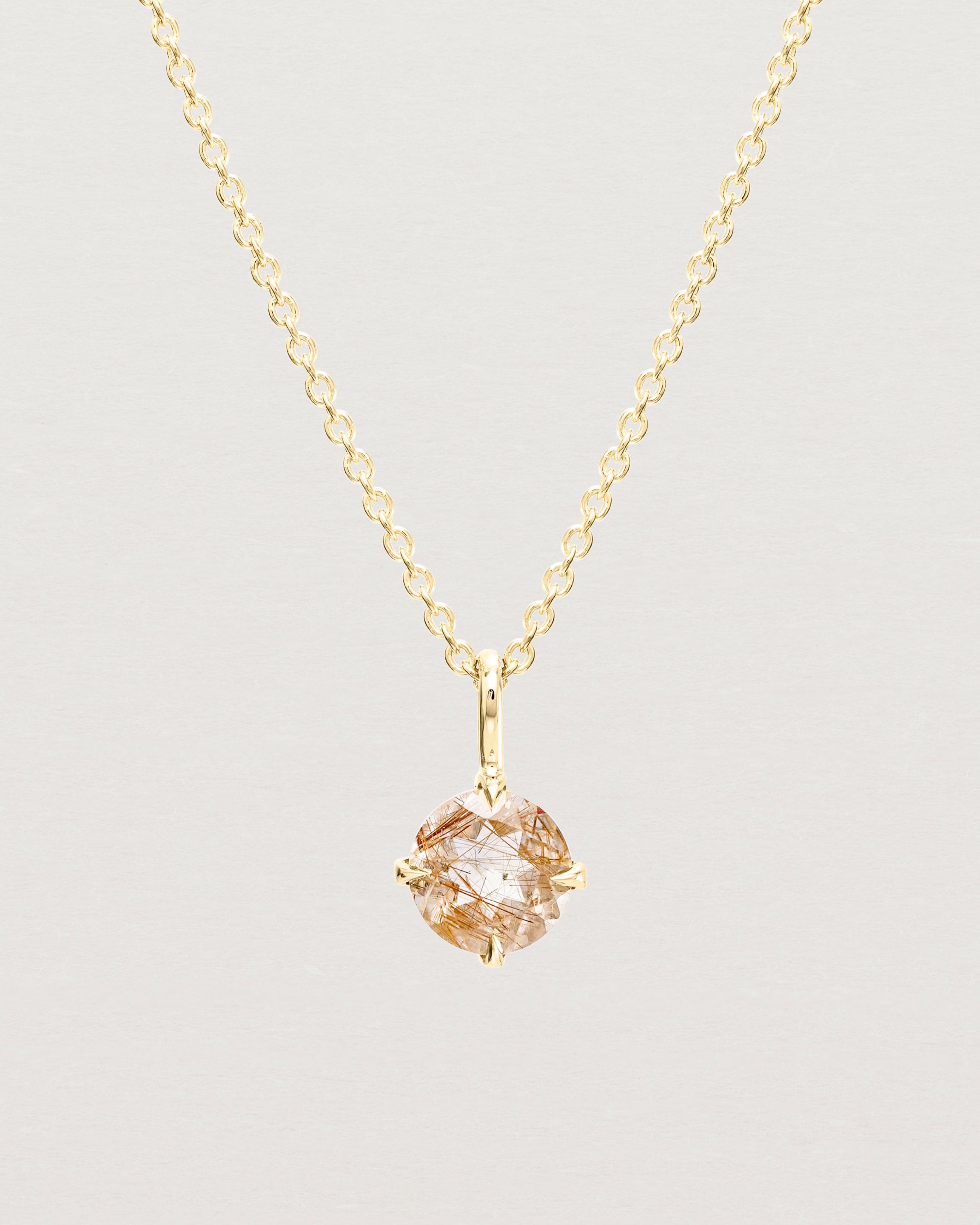 Close up view of the Una Necklace | Rutilated Quartz | Yellow Gold.