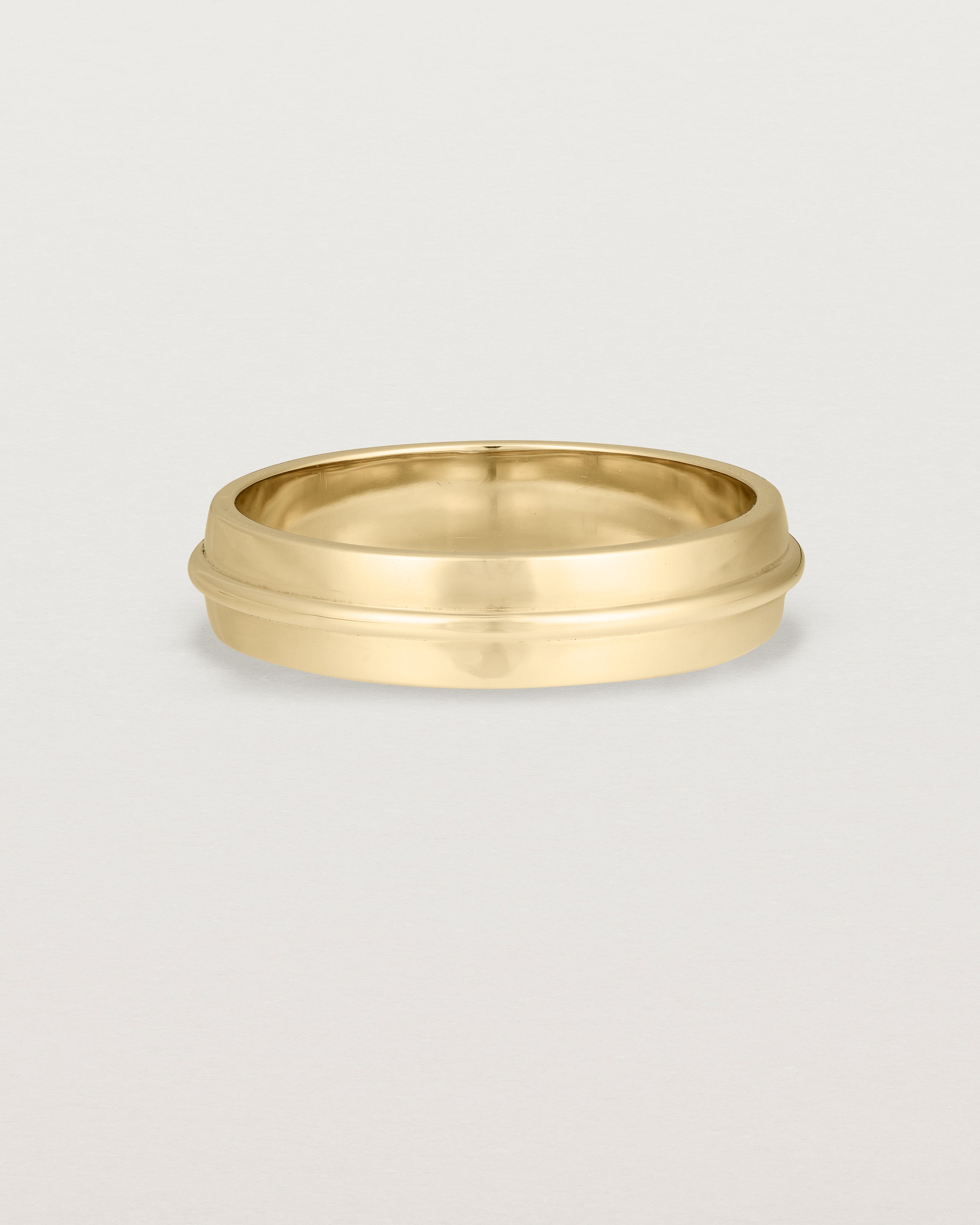 Front view of the Seam Wedding Ring | 5mm | Yellow Gold