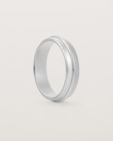 Angled view of the Seam Wedding Ring | 5mm | White Gold